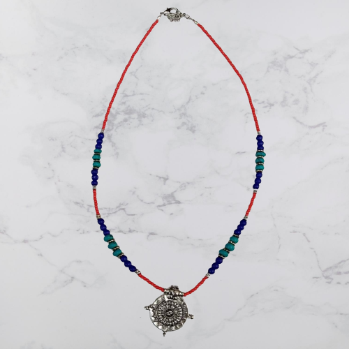 Bohotusk Beaded Choker Chain featuring a Coin Star Pendant, showcasing its elegant design and quality craftsmanship.