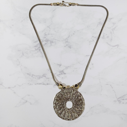 Bohotusk Round Shield Oxidised Silver Pendant Necklace featuring a round shield pendant on a 54cm chain, showcasing its elegant design.