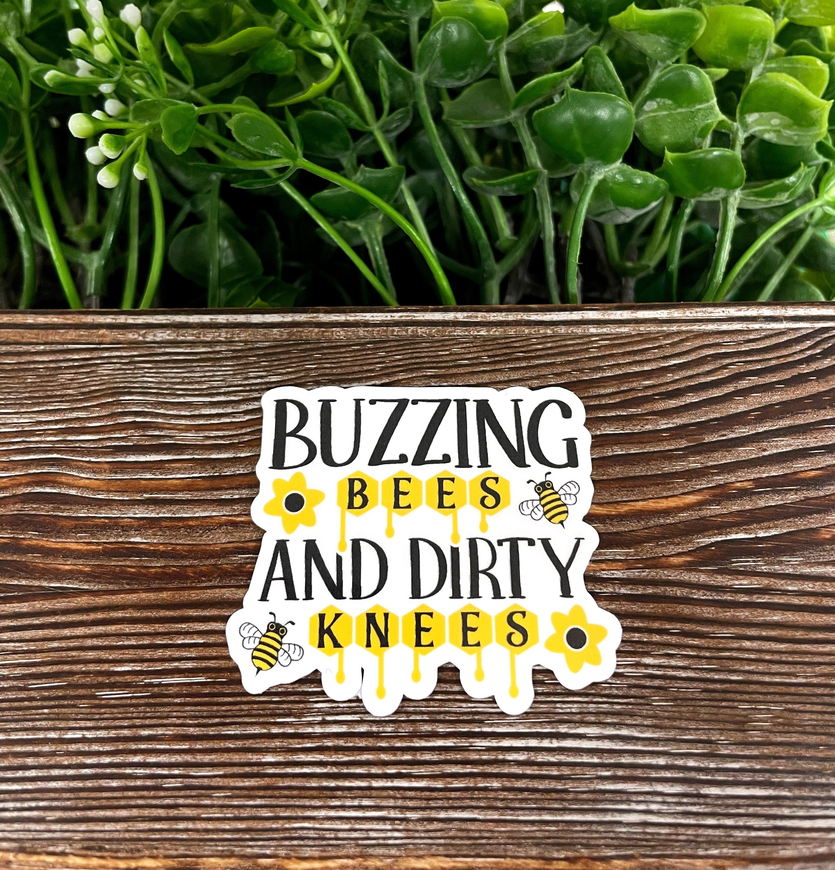 Buzzing Bees and Dirty Knees die cut sticker on a smooth surface, showcasing vibrant colors and unique graphic art.
