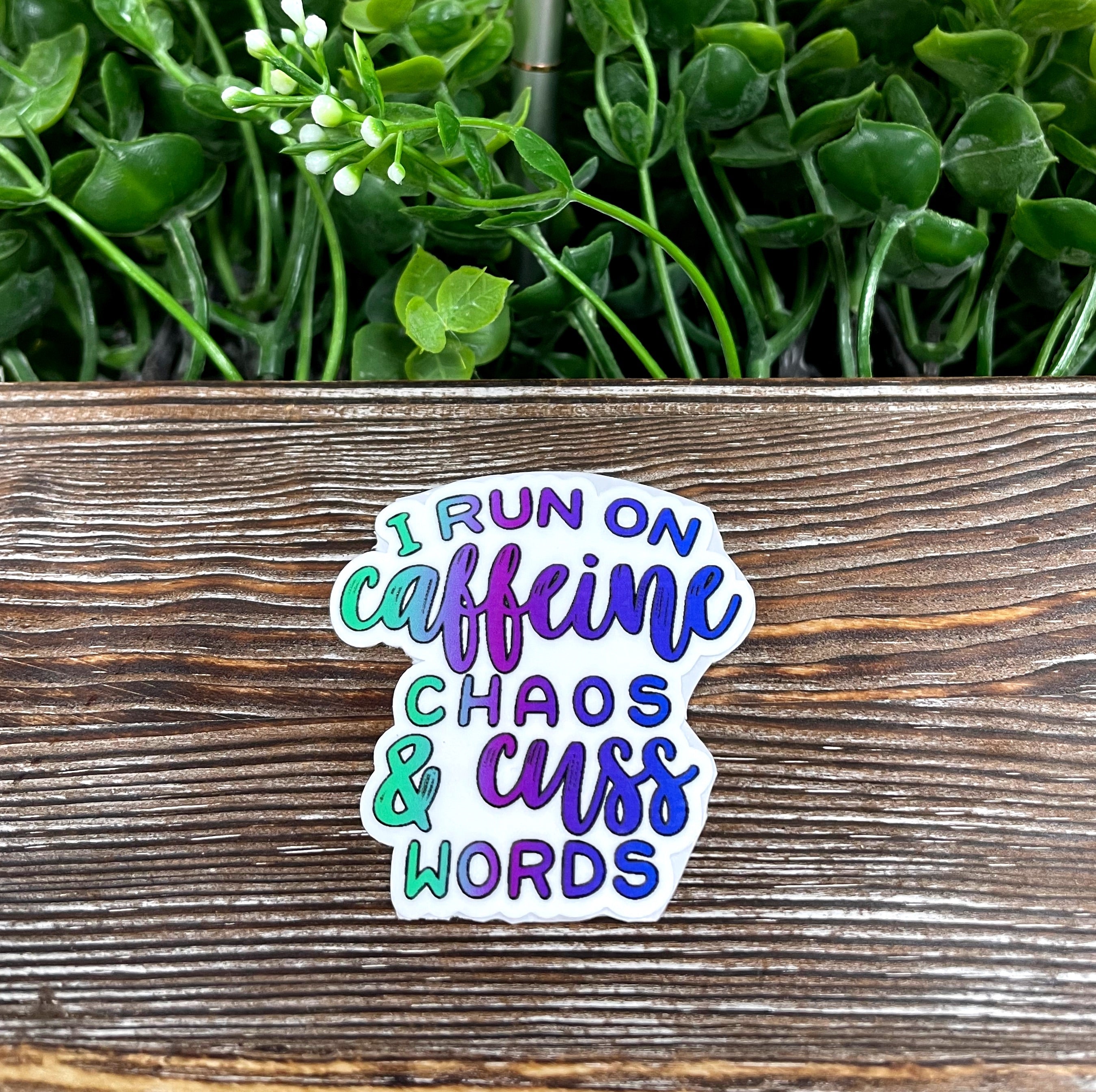 Caffeine and Cuss Words Die Cut Sticker featuring a snarky quote, perfect for personalizing smooth surfaces.