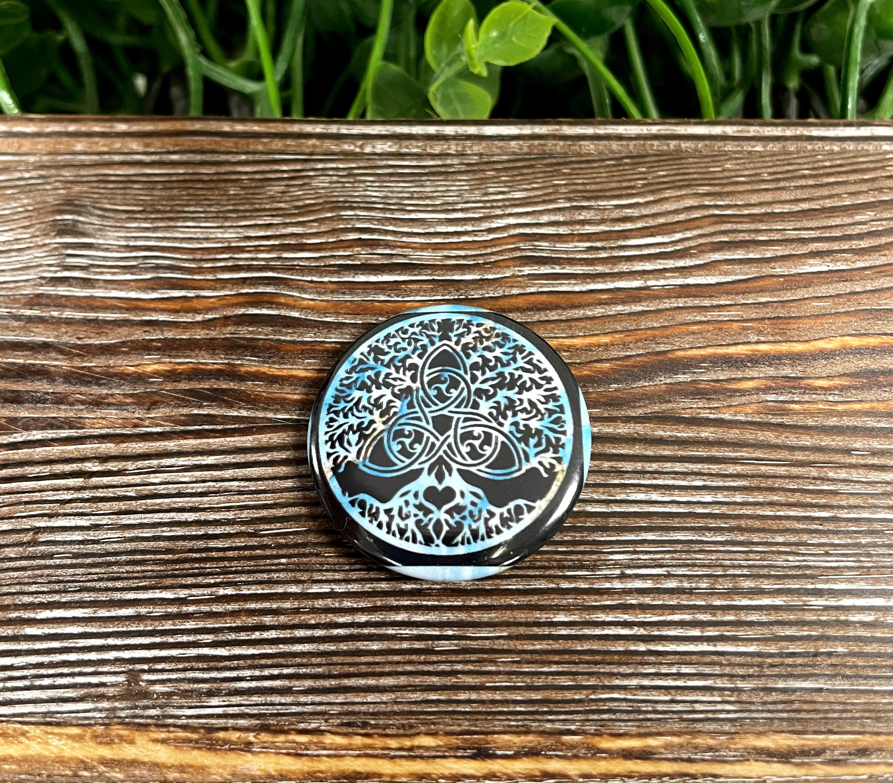 Celtic Tree of Life graphic art button pin with a blue background, measuring 1.25 inches in diameter.