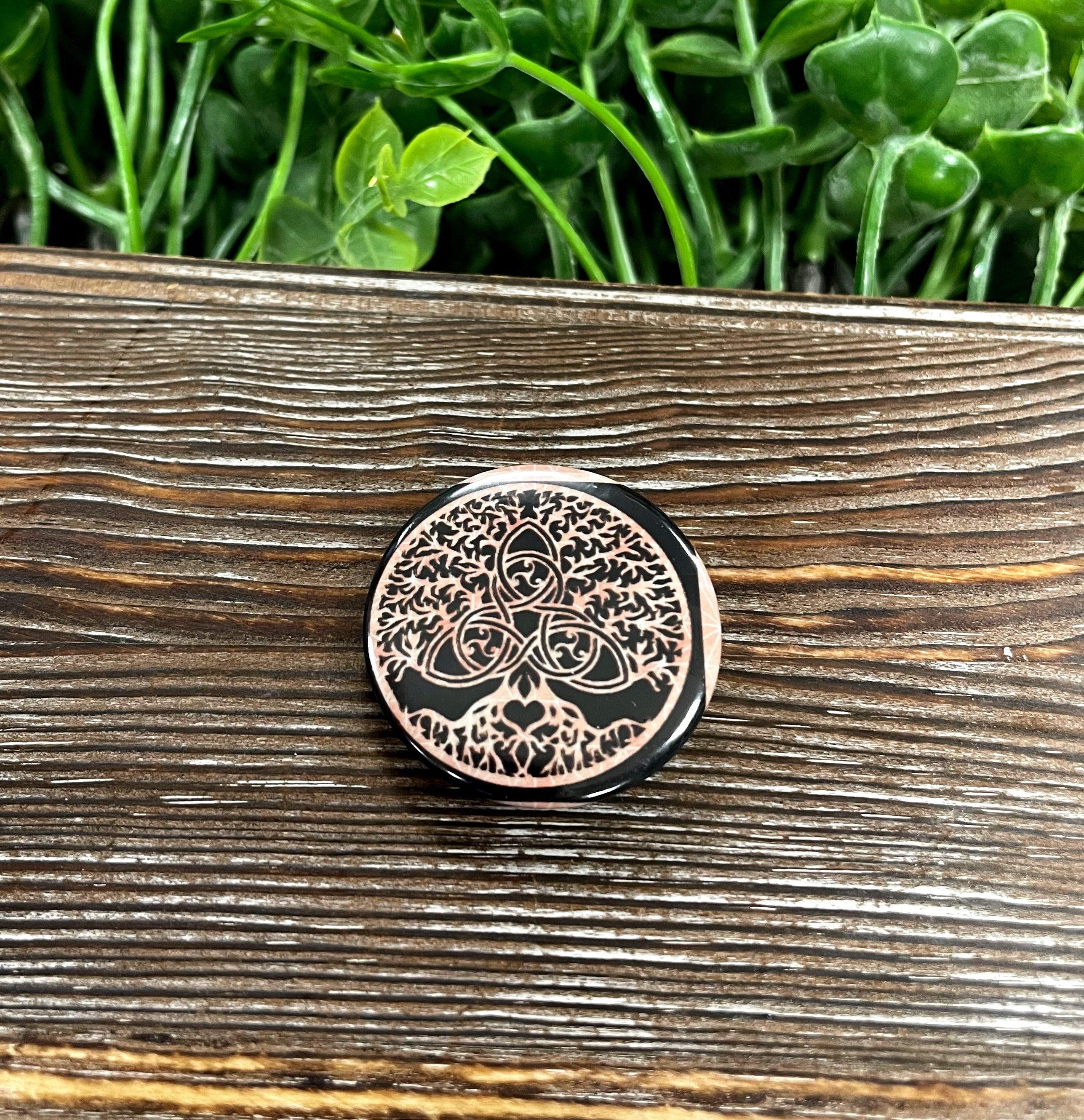 Celtic Tree of Life graphic art button pin with a pink background, measuring 1.25 inches in diameter.