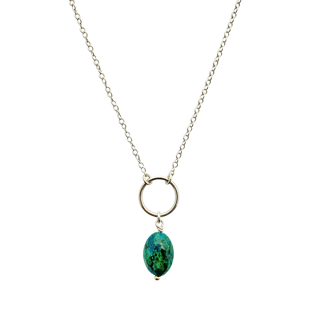 Chrysocolla Circle Necklace featuring an emerald green gemstone pendant on a sterling silver chain, handmade in Peru.