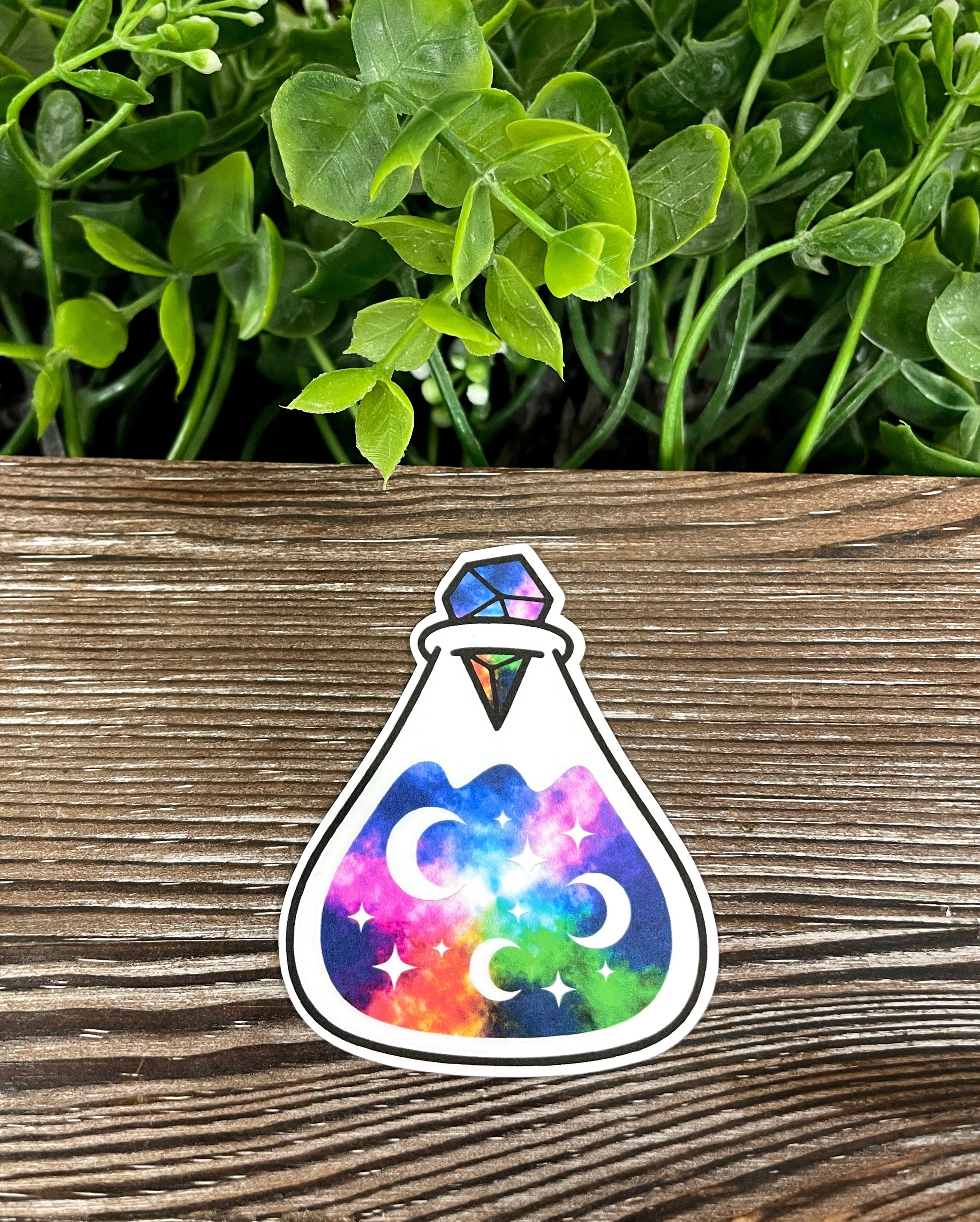 Cosmic Space Potion Bottle die cut vinyl sticker with vibrant colors and boho design, perfect for personalizing various surfaces.