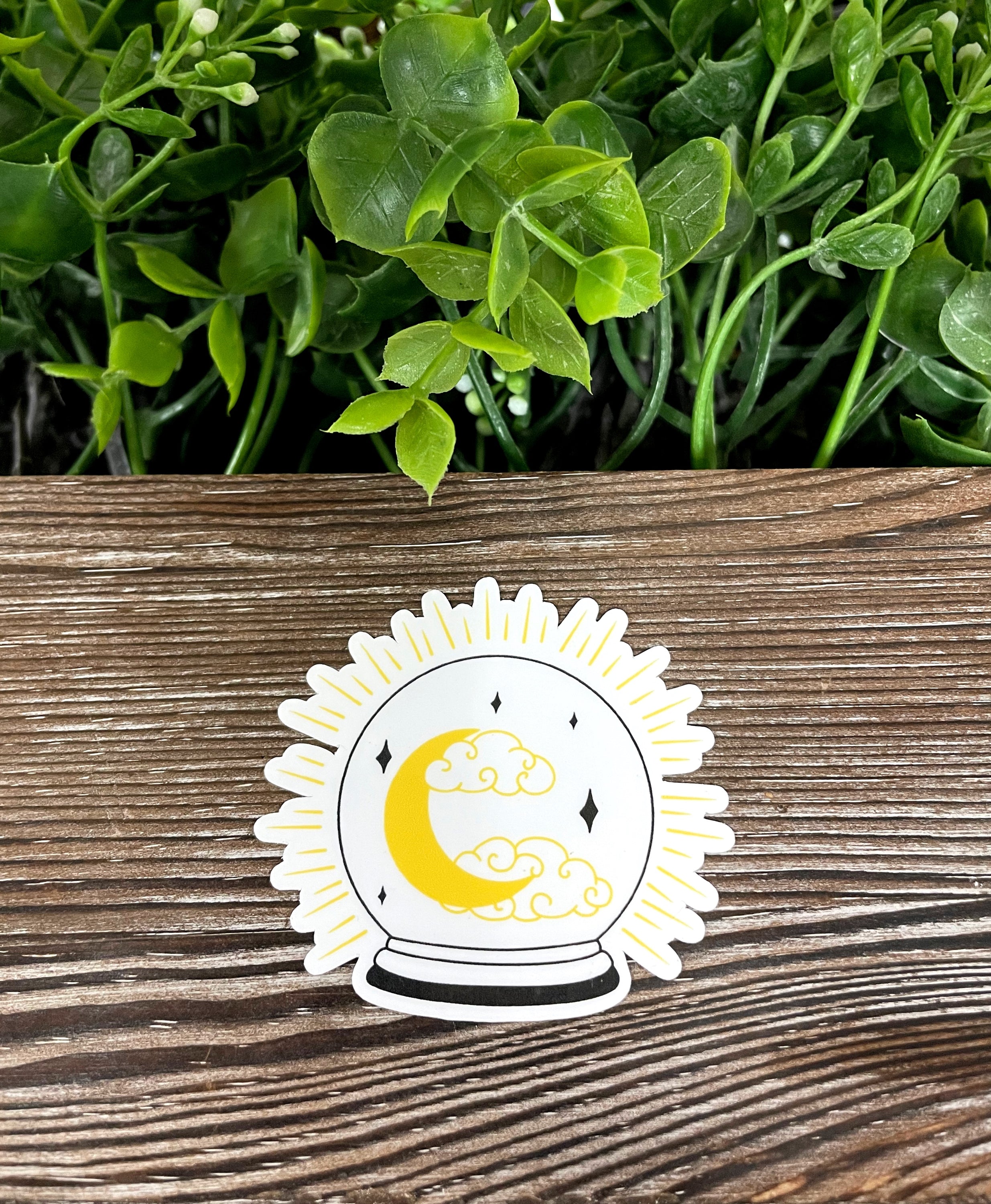 Crystal Ball sticker featuring a moon and clouds design, perfect for personalizing smooth surfaces.