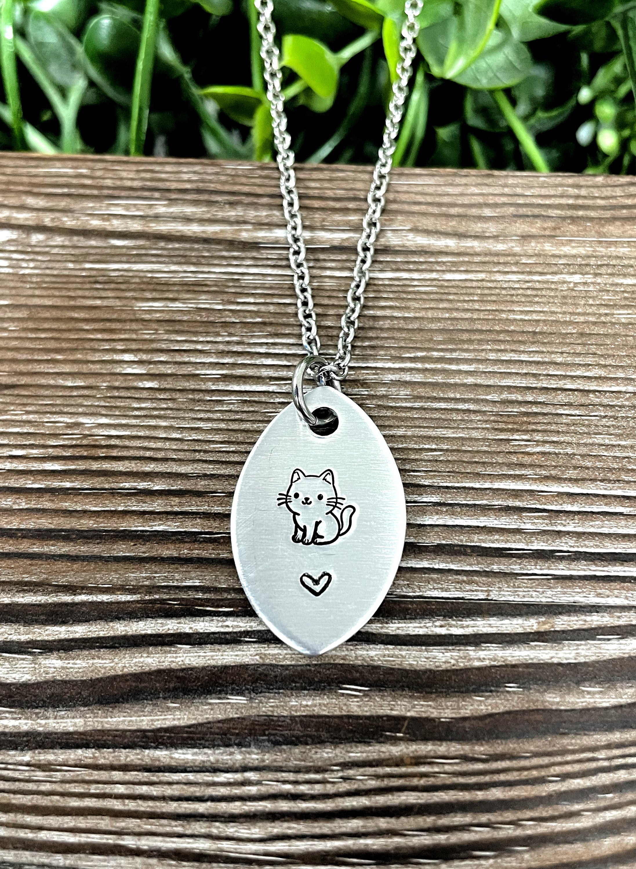 Cute Cat Heart Hand Stamped Necklace featuring a unique design, perfect for cat lovers.