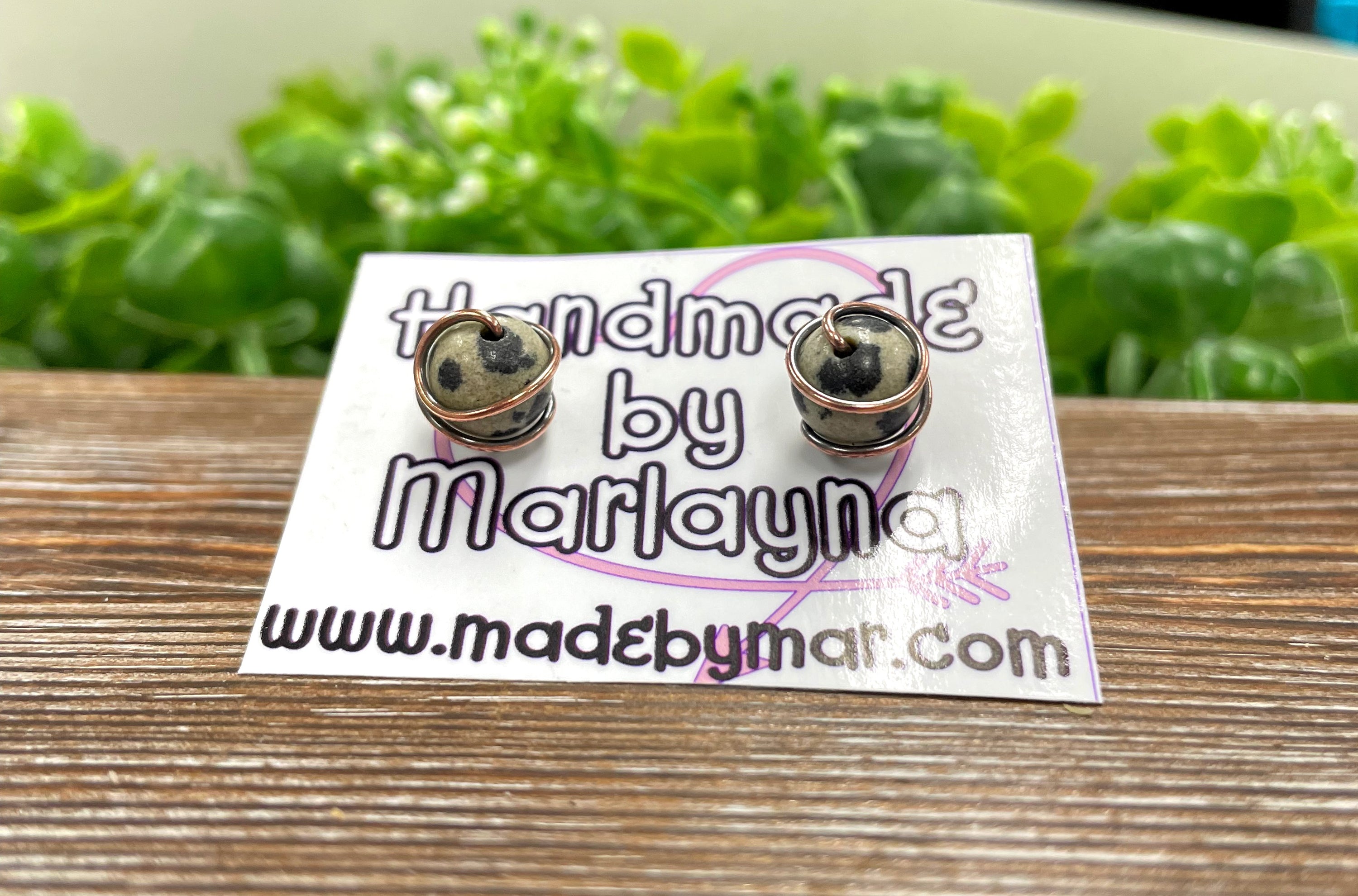 Handmade Dalmatian Jasper gemstone copper stud earrings with unique spotted patterns and oxidized copper setting.