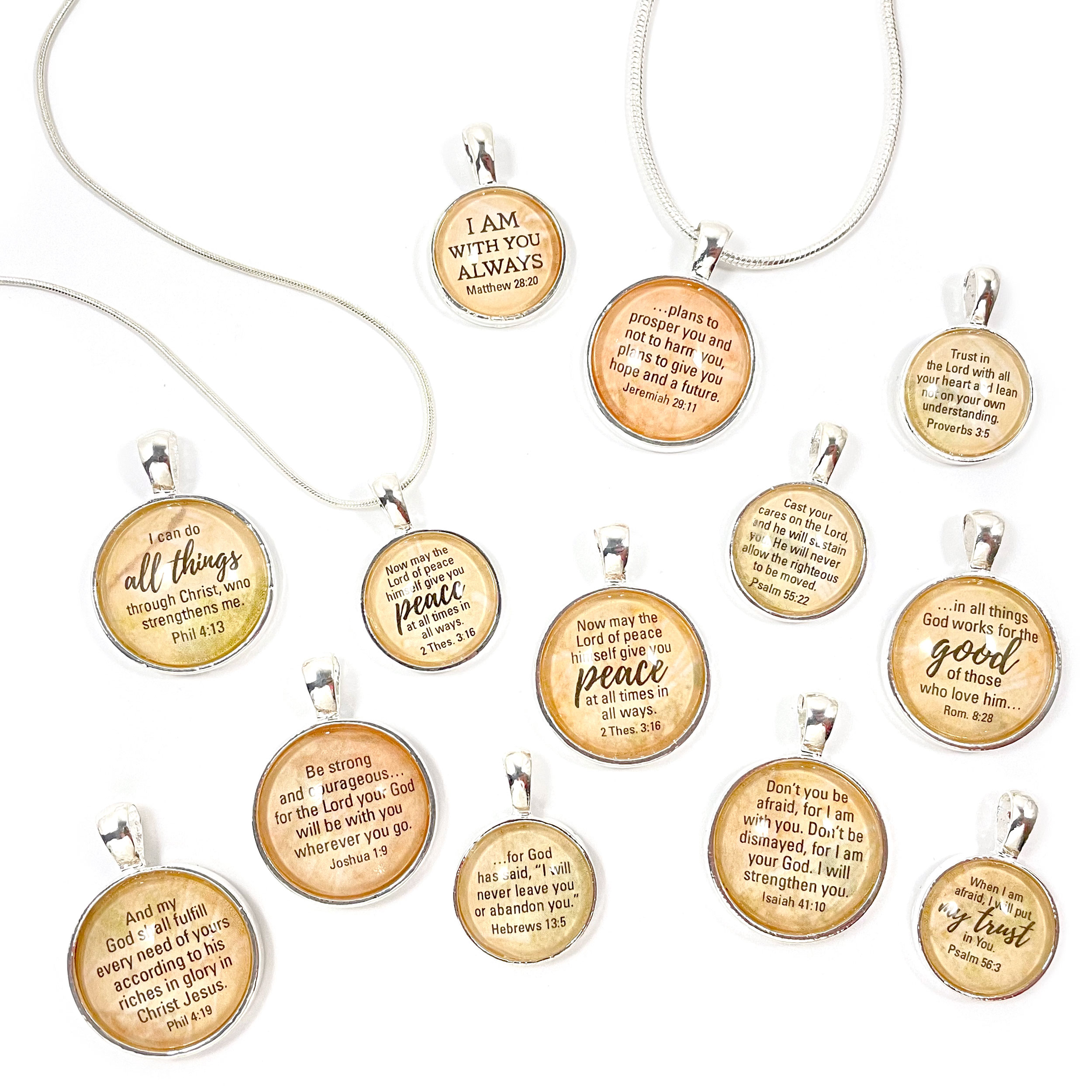Silver-plated Encouraging Scriptures Pendant Necklace featuring a glass cabochon with Bible verses, strung on a silver-plated chain.