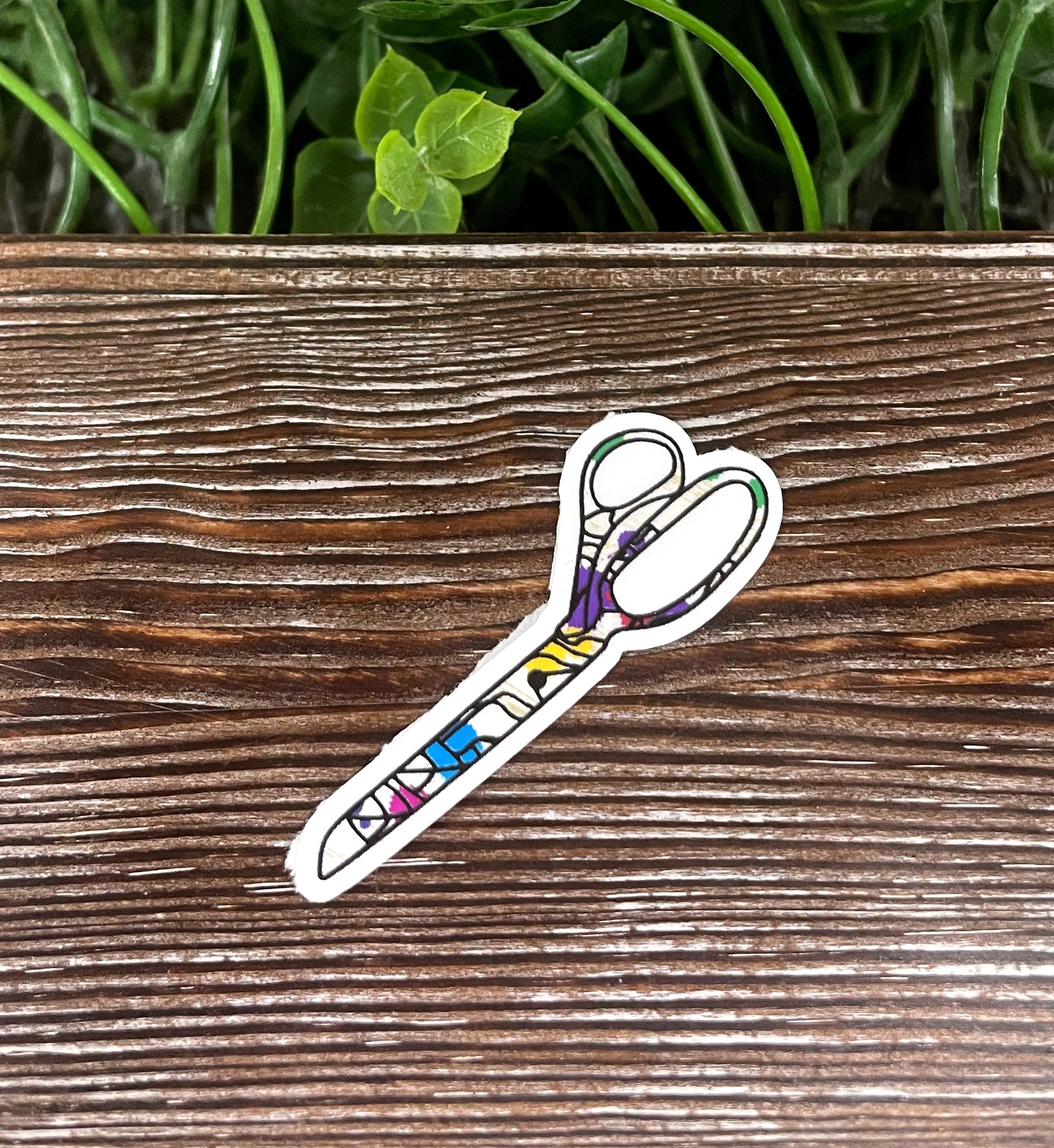 A collection of vibrant die cut stickers showcasing various designs, perfect for personalizing items like notebooks and water bottles.