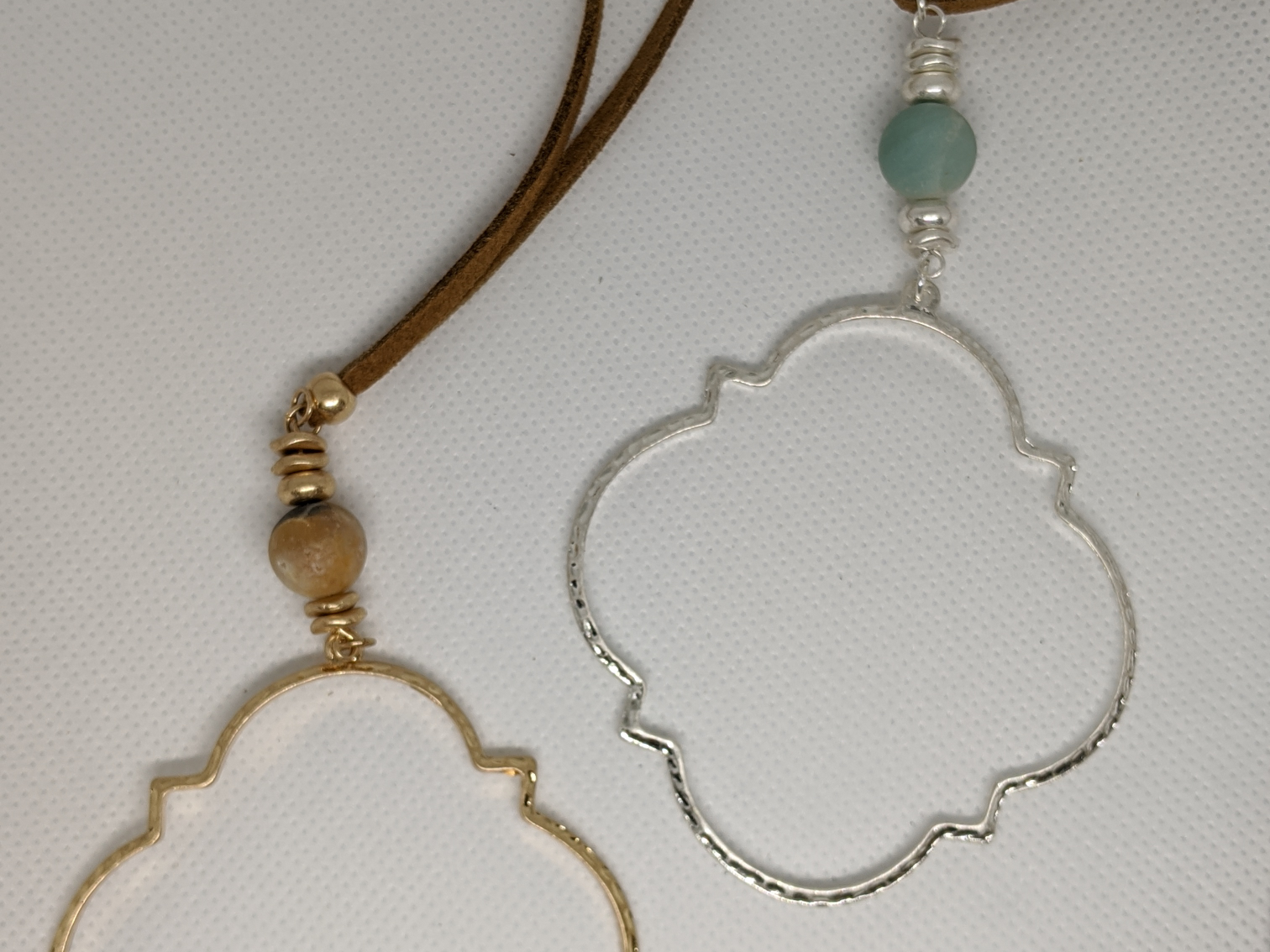 Faux Leather Moroccan Pendant Pull Tie Necklace featuring an adjustable strap and intricate pendant design.