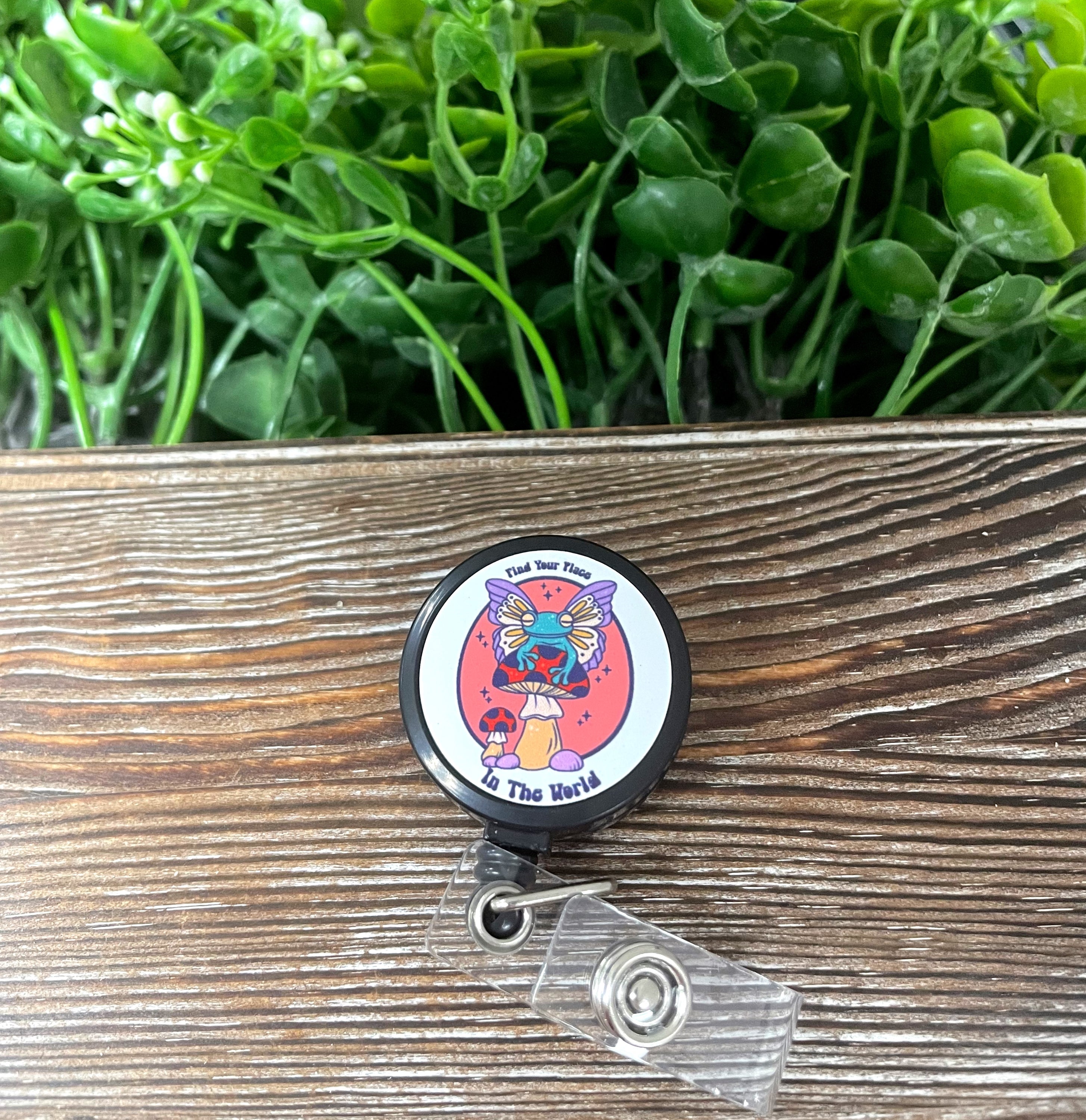Colorful retractable badge reel with Boho Fun design, featuring a metal blank and plastic reel.