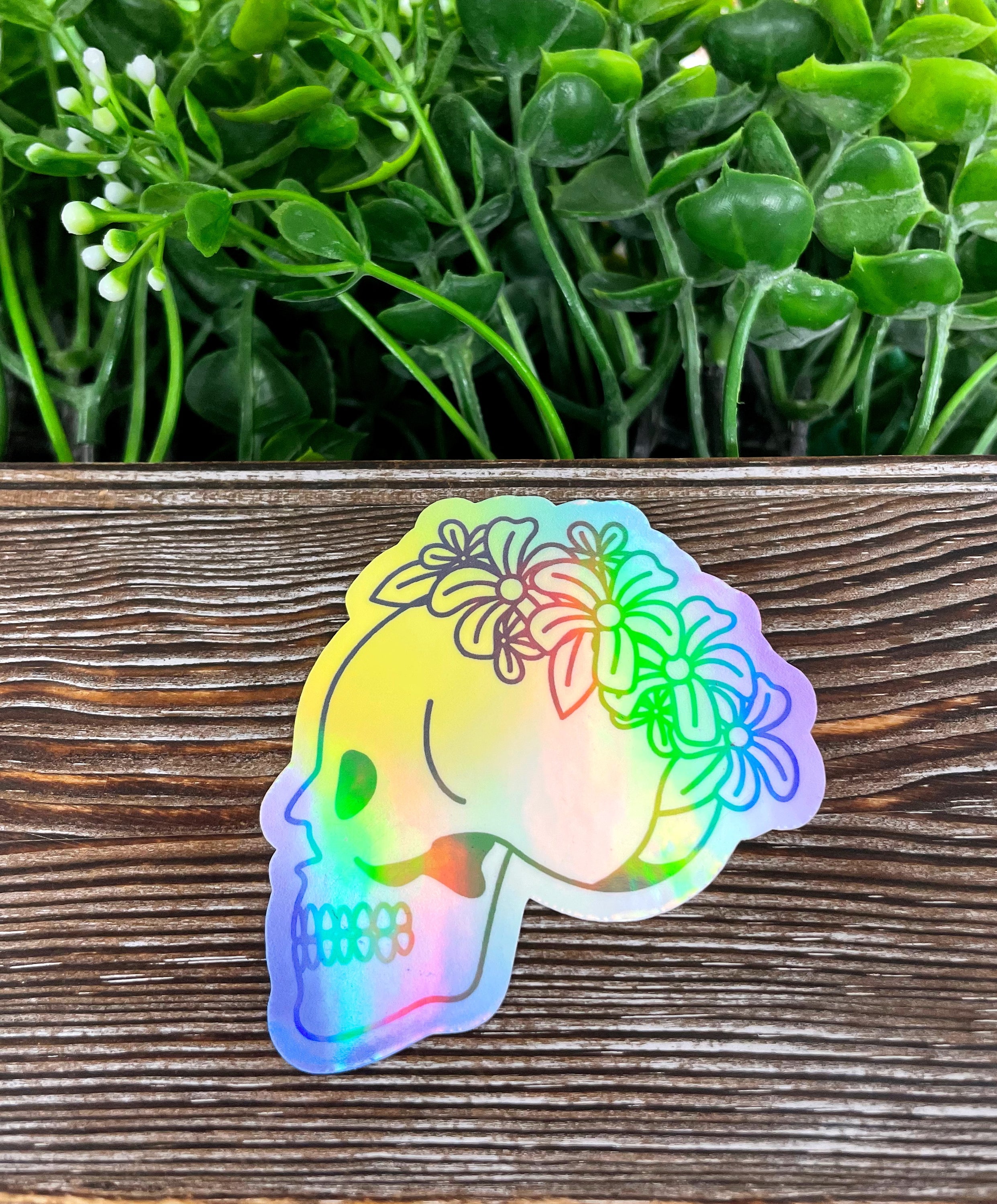 Floral Skull Profile die cut vinyl sticker featuring vibrant colors and intricate floral designs, perfect for personalizing various surfaces.