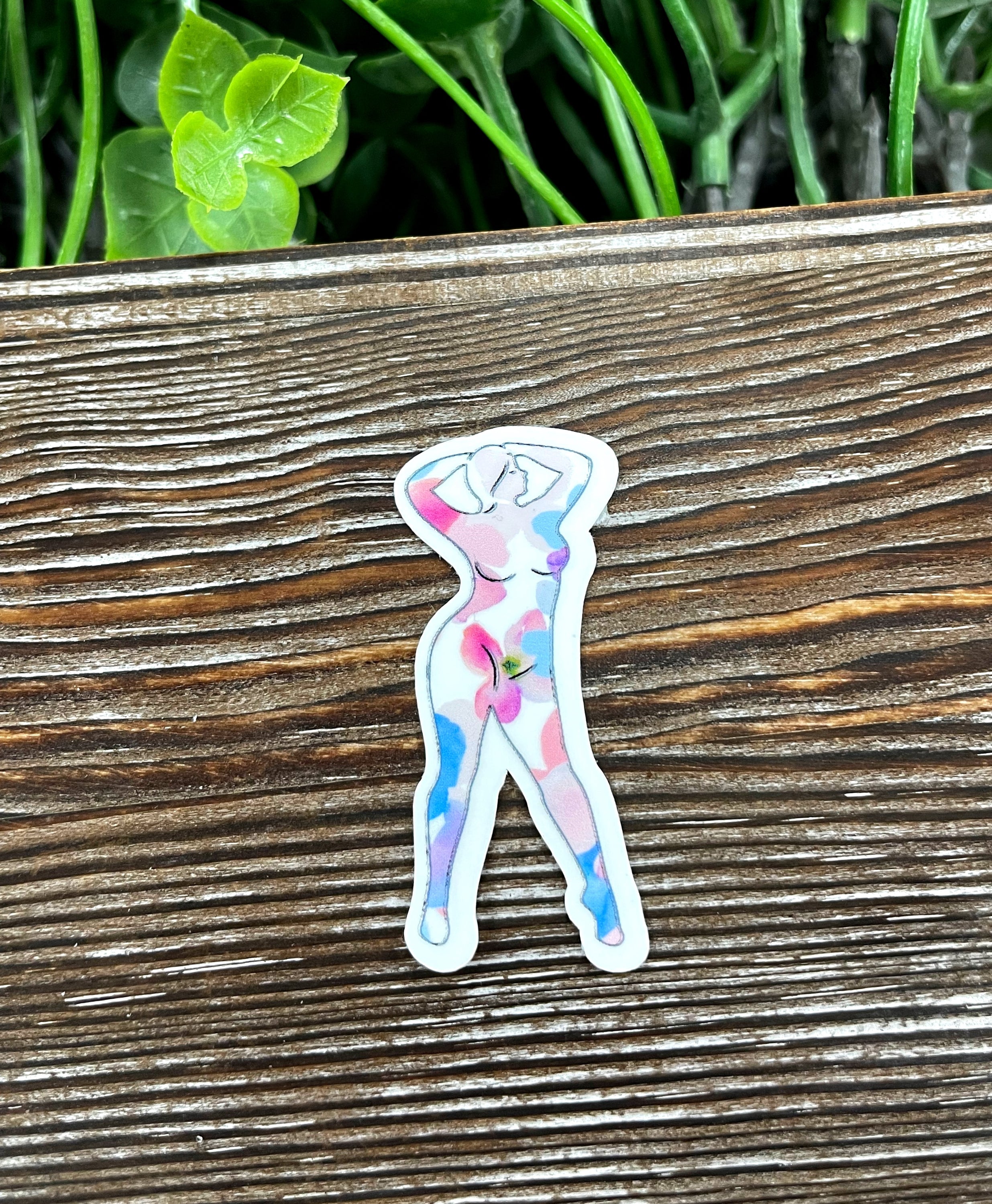 Flower Pattern Woman Silhouette Die Cut Sticker on a smooth surface, showcasing vibrant colors and intricate design.