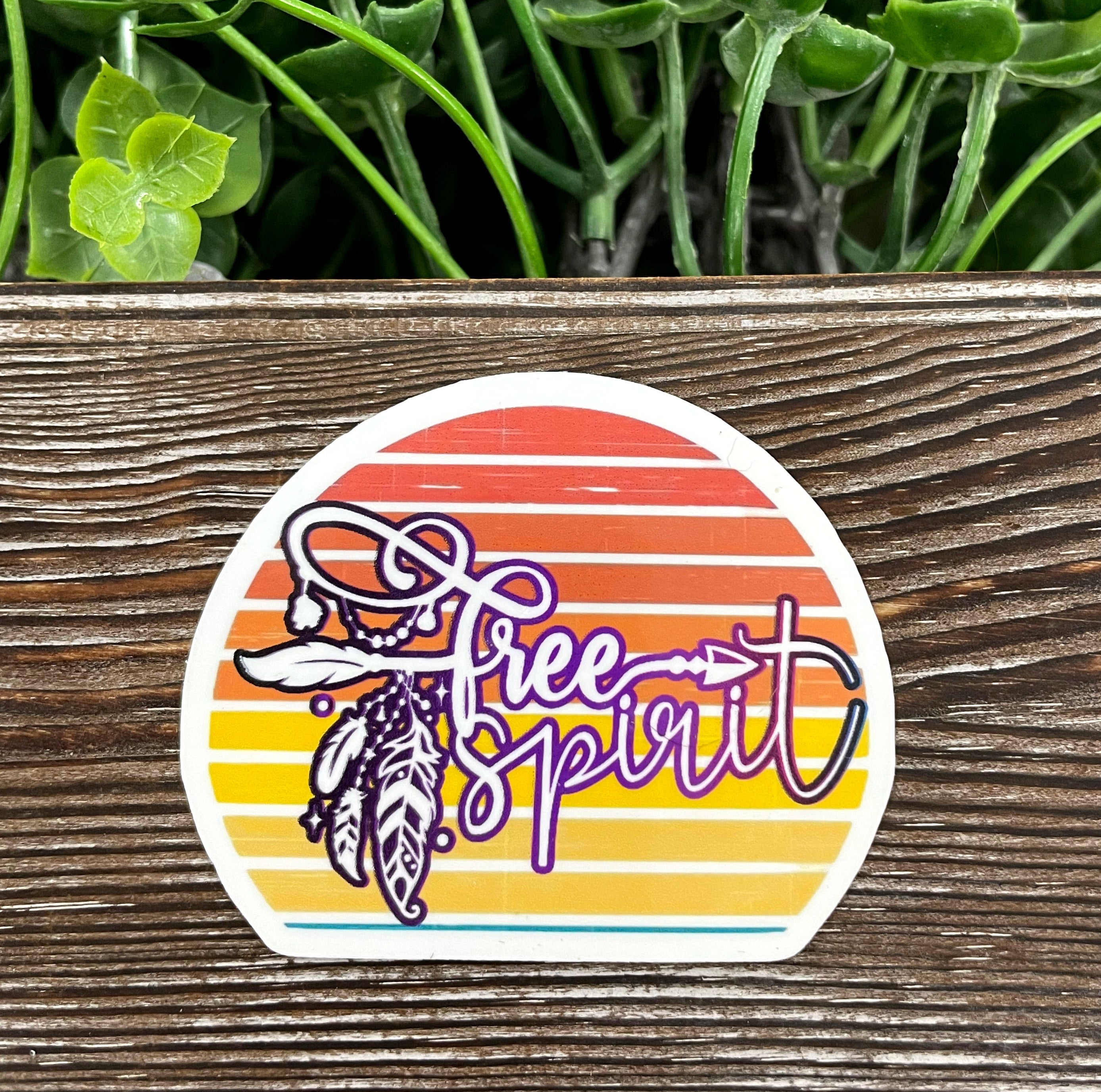 Free Spirit Boho Die Cut Sticker featuring vibrant graphic art on a smooth surface, showcasing its unique design and quality vinyl material.