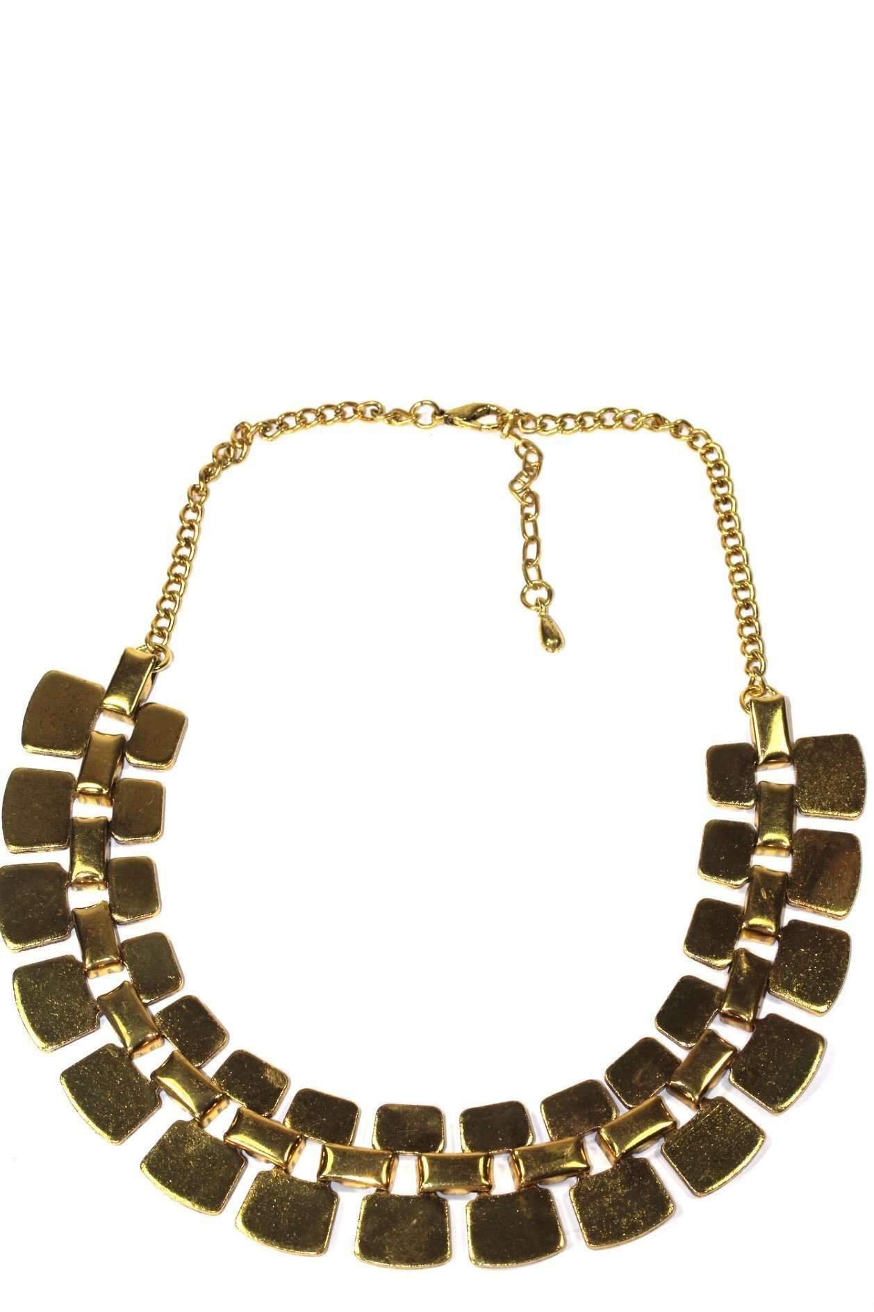 Golden Nugget Tribal Necklace featuring antique gold tone and linked metal nuggets, showcasing a unique tribal design.
