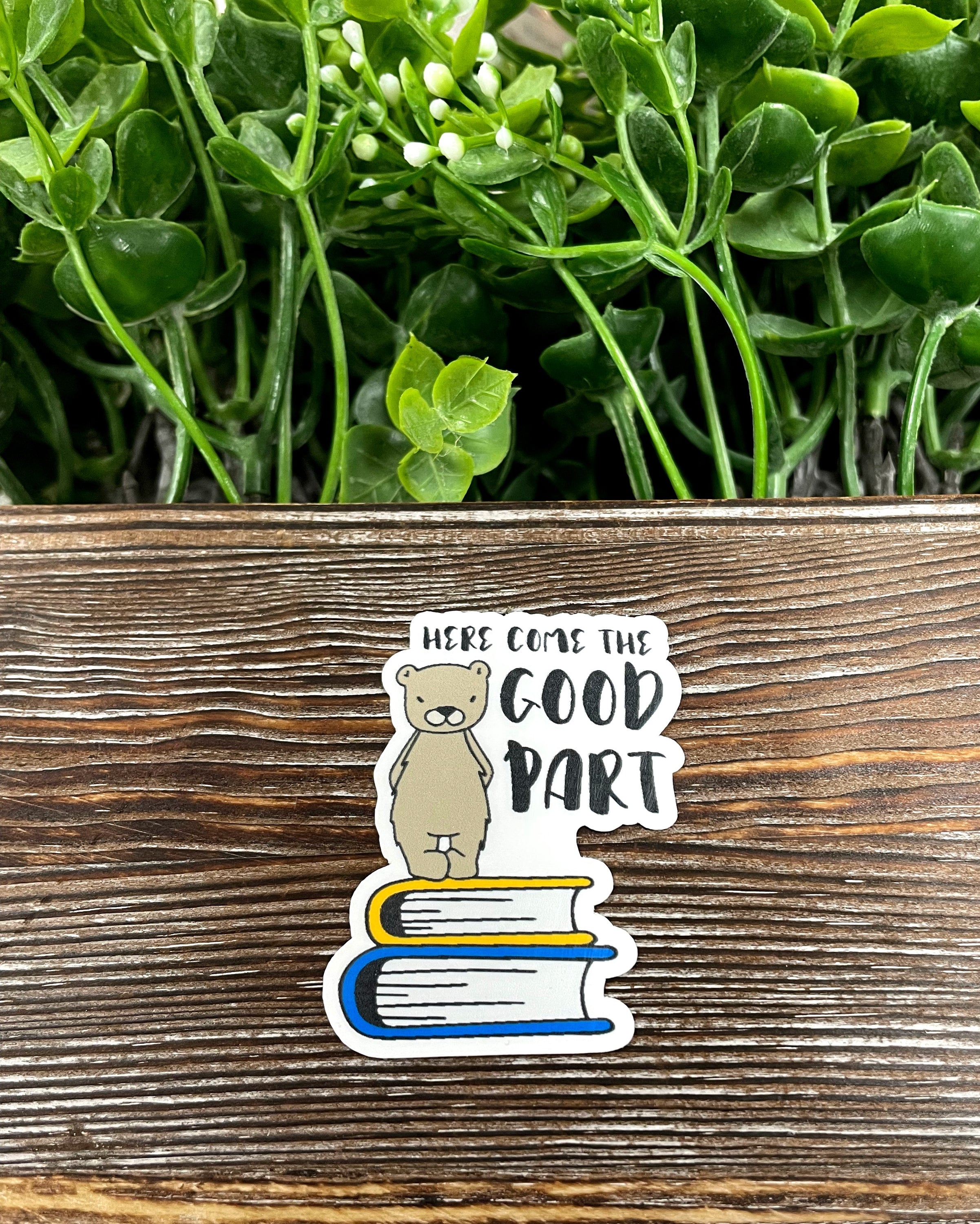 Die cut sticker featuring the phrase 'Here Comes the Good Part' with a book design, perfect for personalizing items.