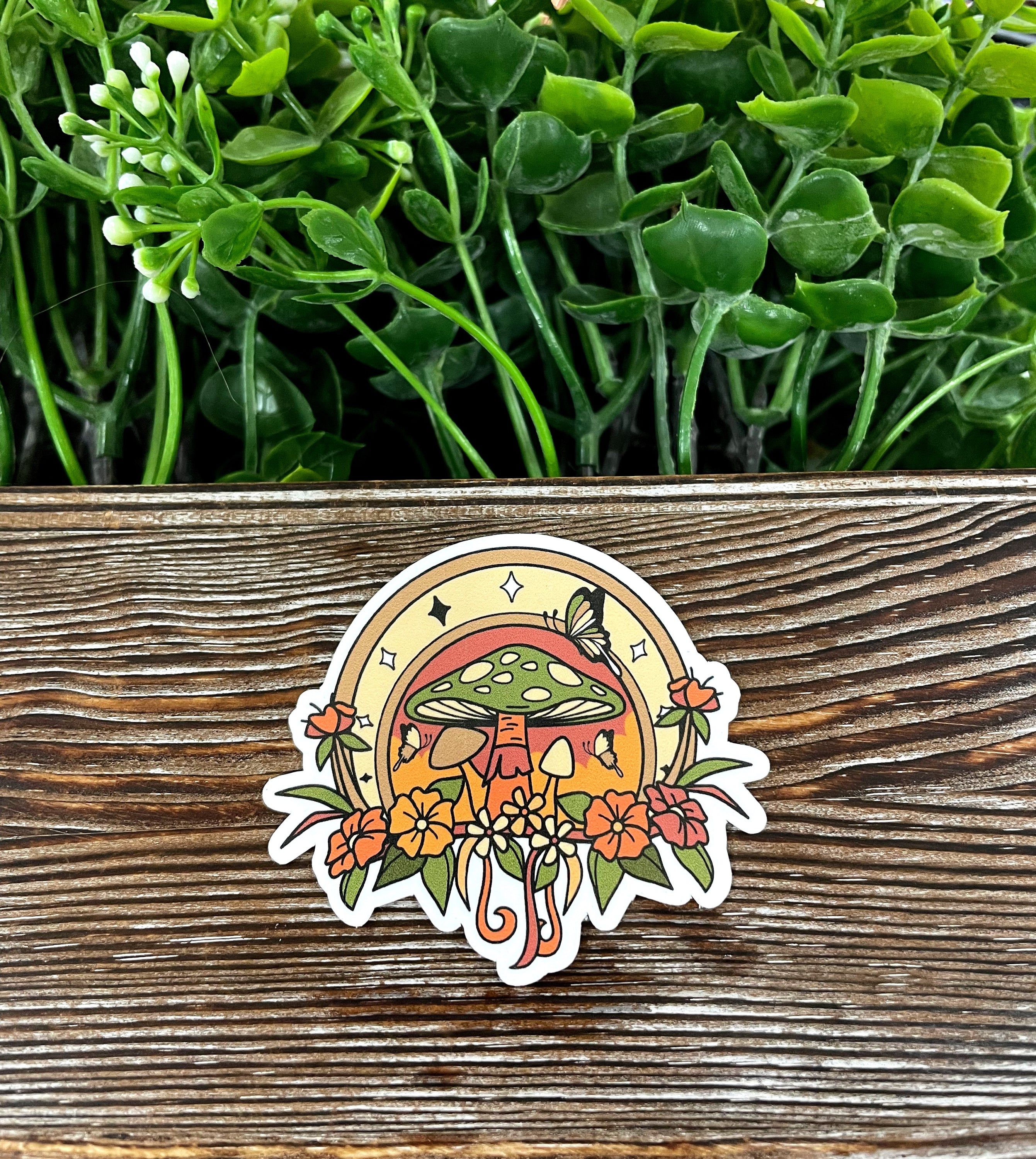 Horseshoe Mushroom Flowers die cut vinyl sticker on a smooth surface, showcasing vibrant colors and intricate design.