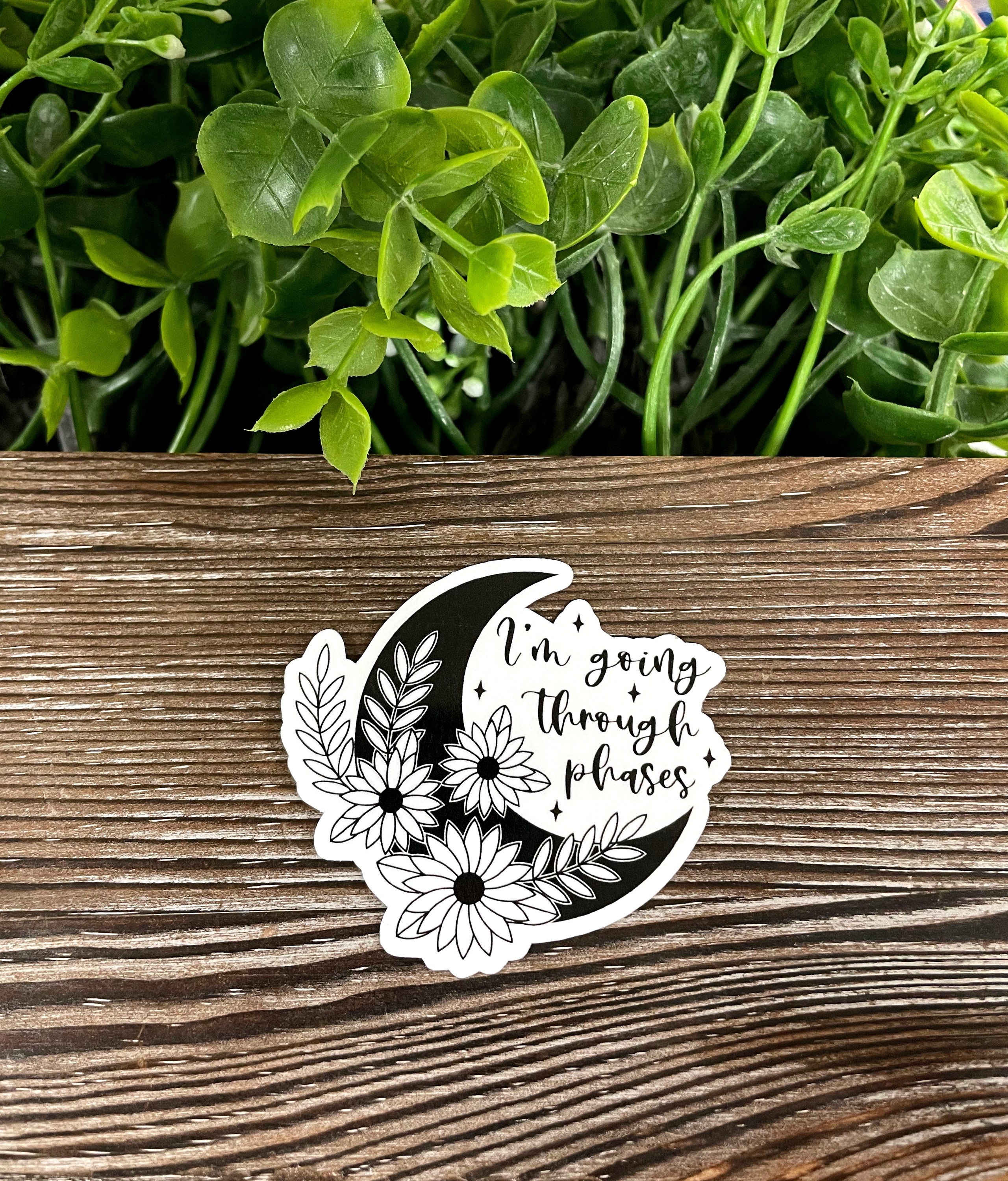 Crescent Moon die cut vinyl sticker with boho design, showcasing intricate details and vibrant colors, perfect for personalizing various surfaces.