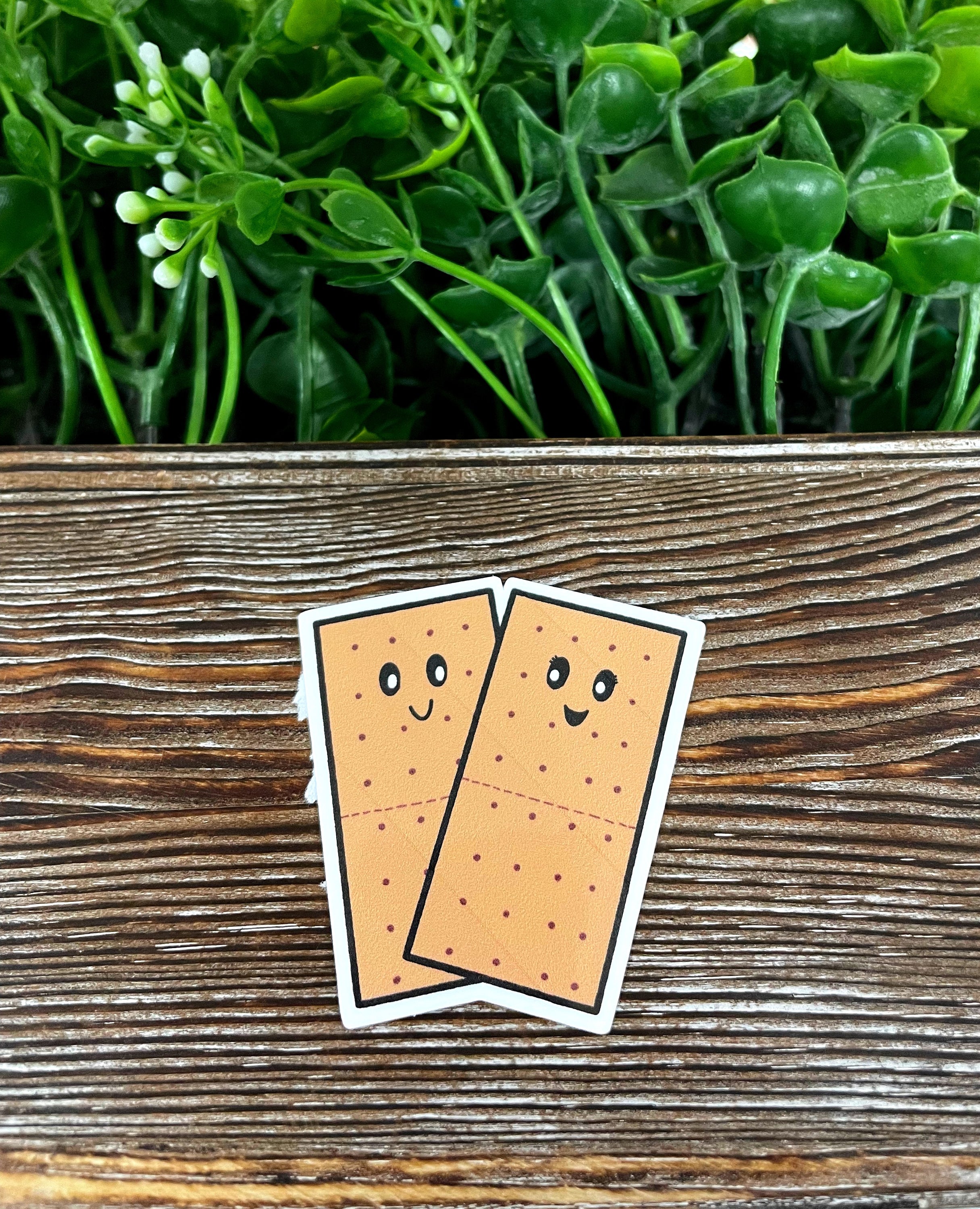 Kawaii Graham Crackers die cut sticker featuring vibrant colors and cute graphic art, perfect for personalizing various surfaces.