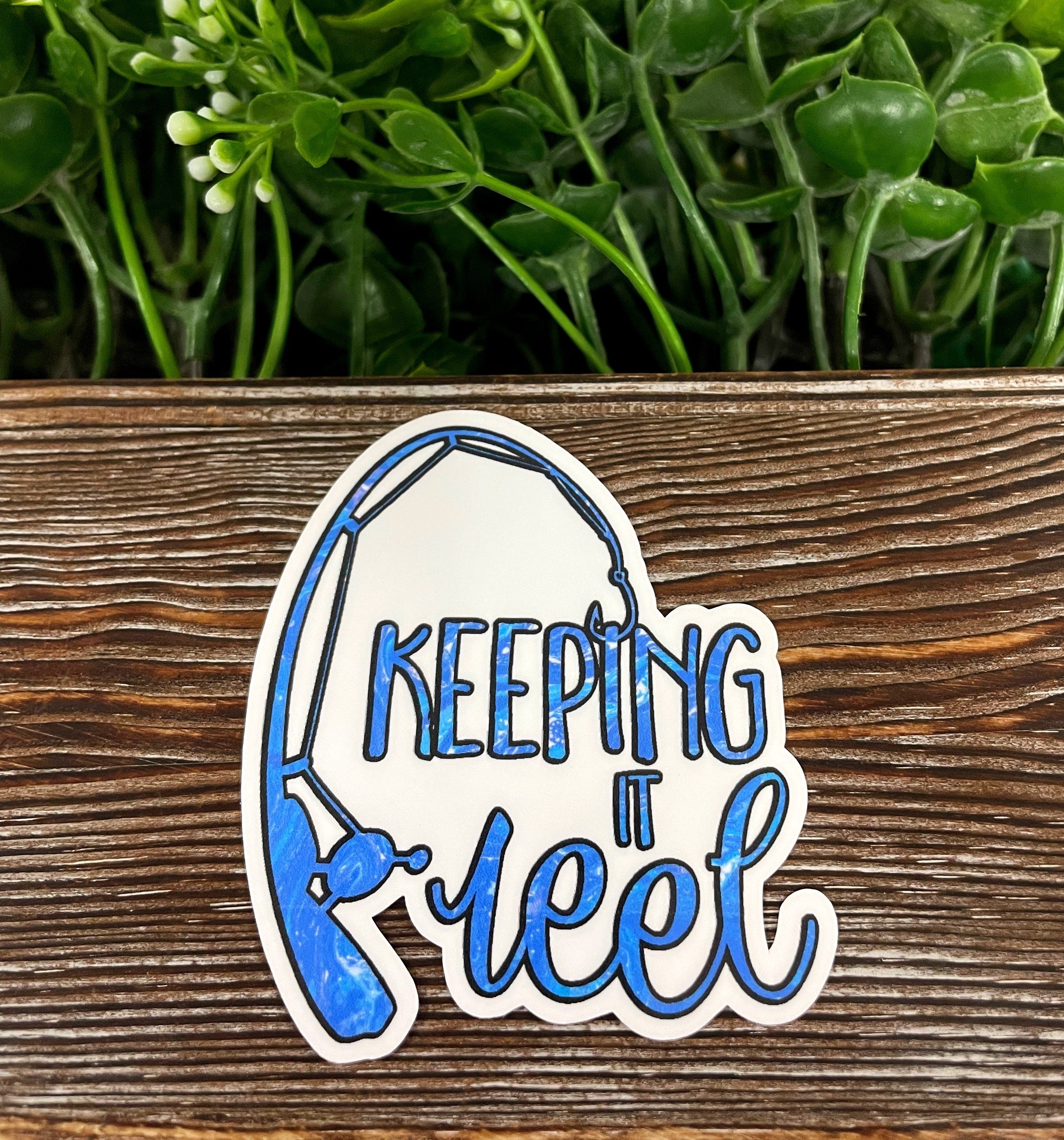 Colorful Keeping it Reel Fishing die cut vinyl sticker featuring boho design, perfect for personalizing water bottles and notebooks.