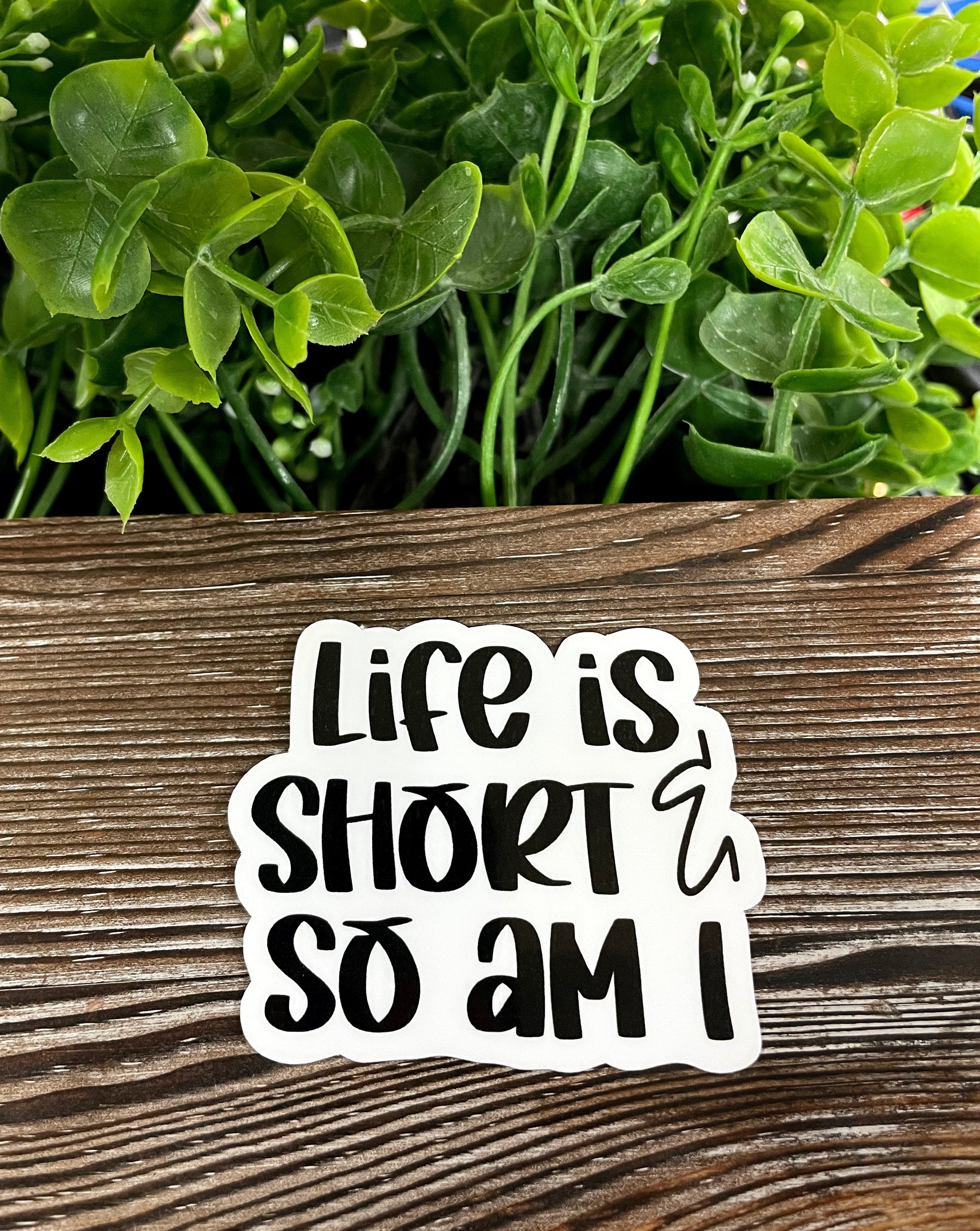 Die cut vinyl sticker featuring the phrase 'Life is Short and So Am I' with a boho design, perfect for personalizing various items.