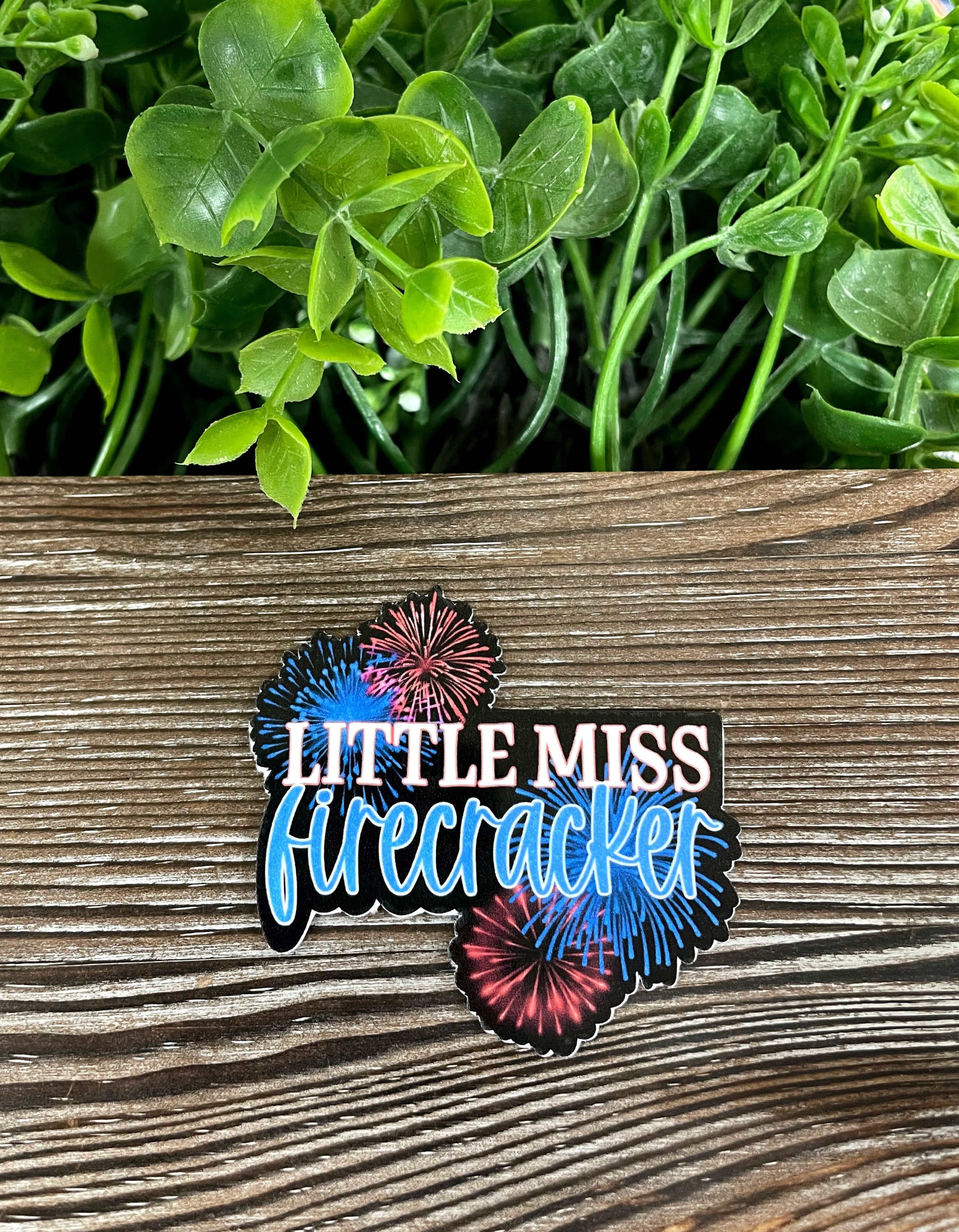 Little Miss Firecracker die cut vinyl sticker in red, white, and blue, showcasing a vibrant design perfect for personal expression.