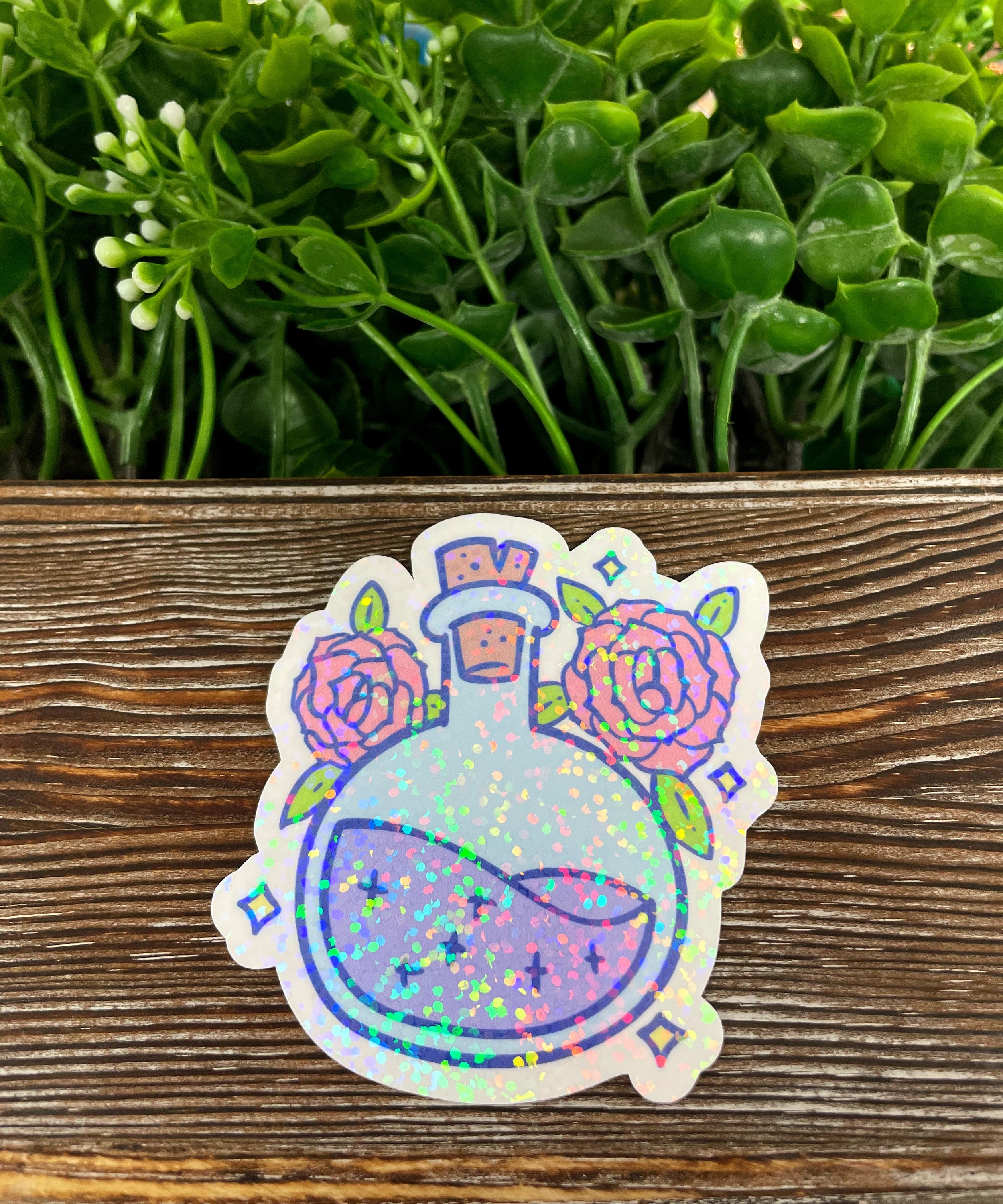 Magical Purple Potion Bottle die cut sticker on a smooth surface, showcasing vibrant colors and intricate design.