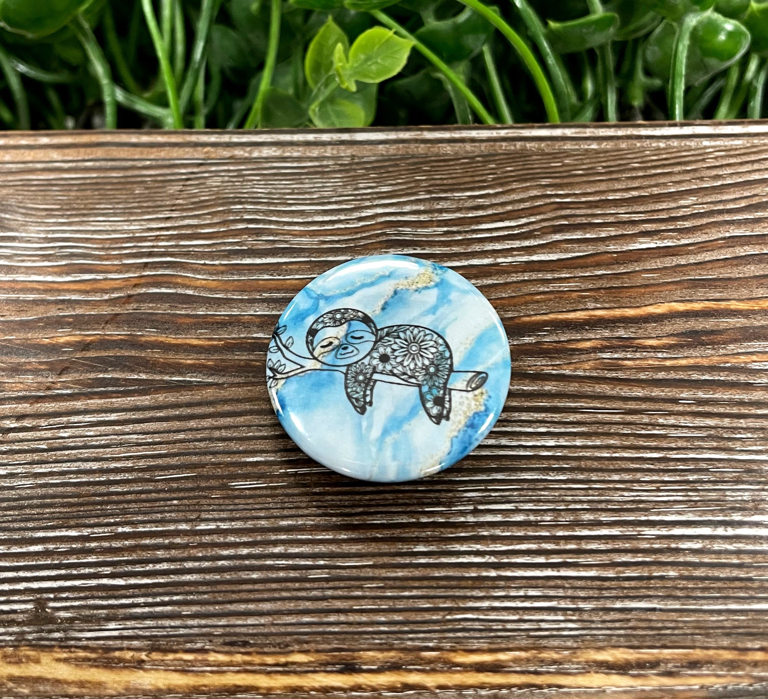 Mandala Sloth graphic art button with blue agate marble design, 1.25 inches in size.