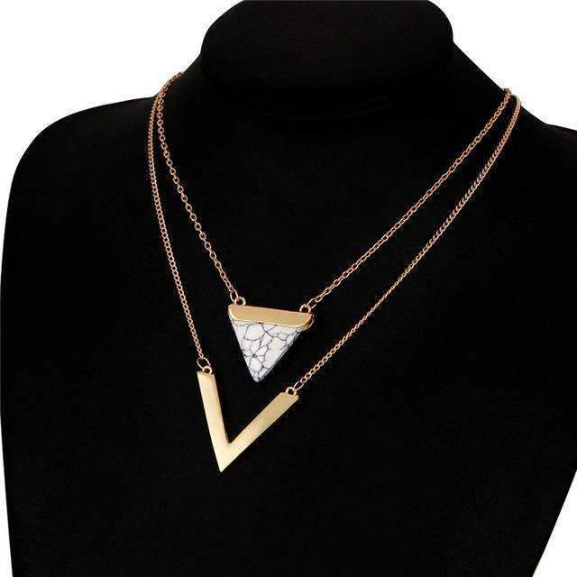 Elegant Marble Chevron Double Layer Necklace featuring a black or white marble triangle and a golden chevron accent.