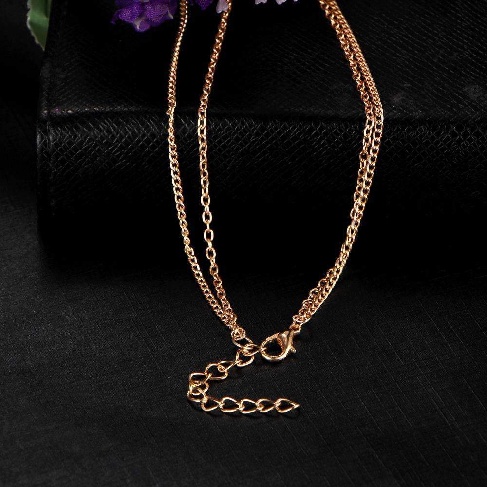 Elegant Marble Chevron Double Layer Necklace featuring a black or white marble triangle and a golden chevron accent.