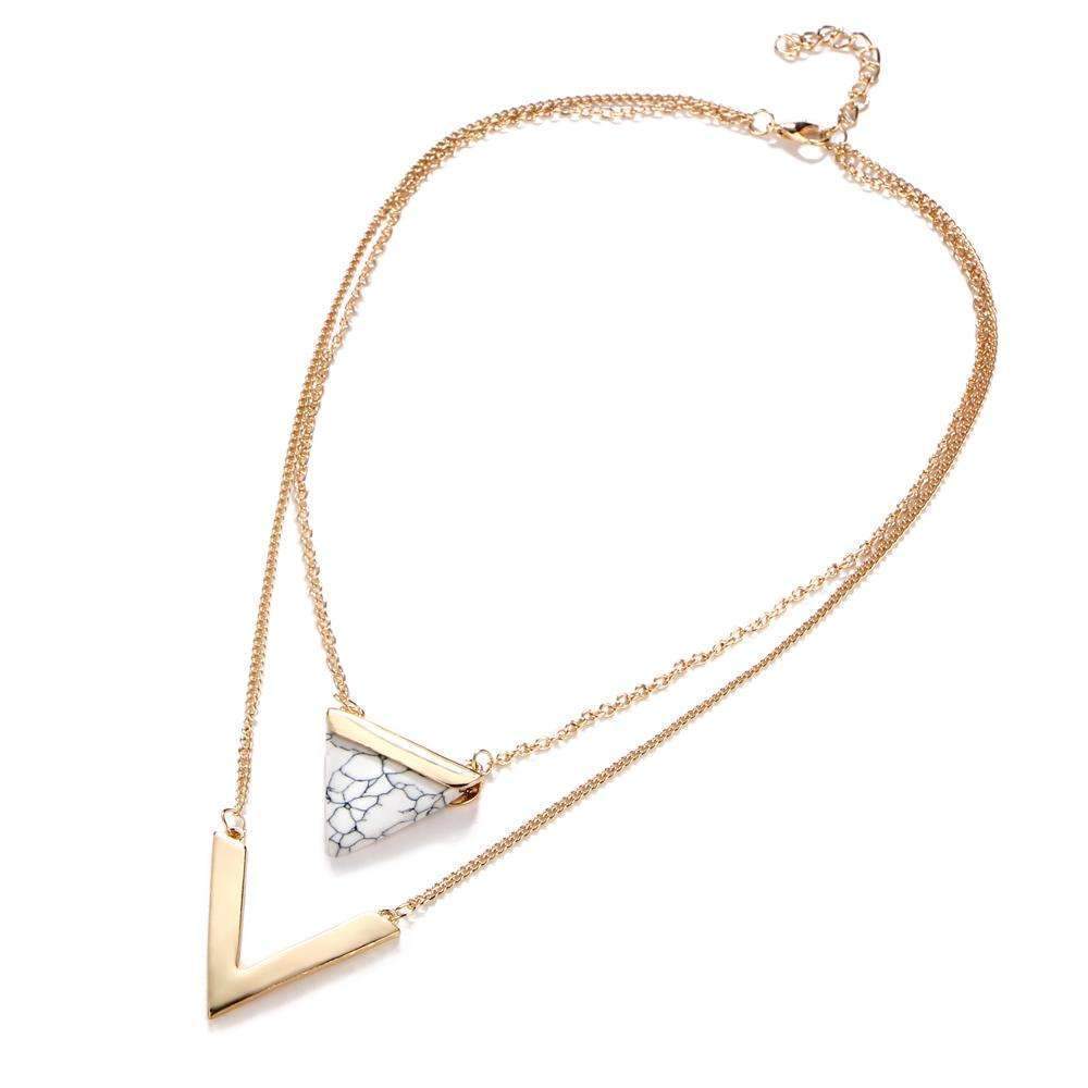 Elegant Marble Chevron Double Layer Necklace featuring a black or white marble triangle and a golden chevron accent.