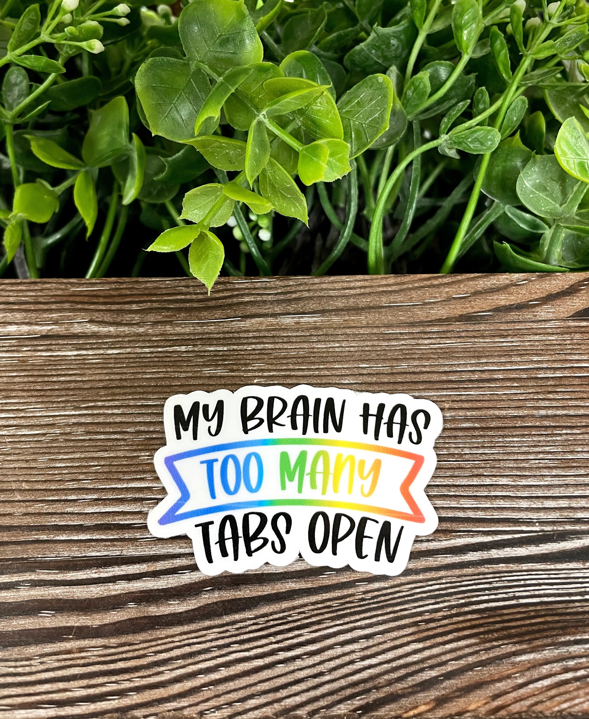 My Brain Has Too Many Tabs Open sticker on a smooth surface, showcasing its vibrant colors and die-cut design.