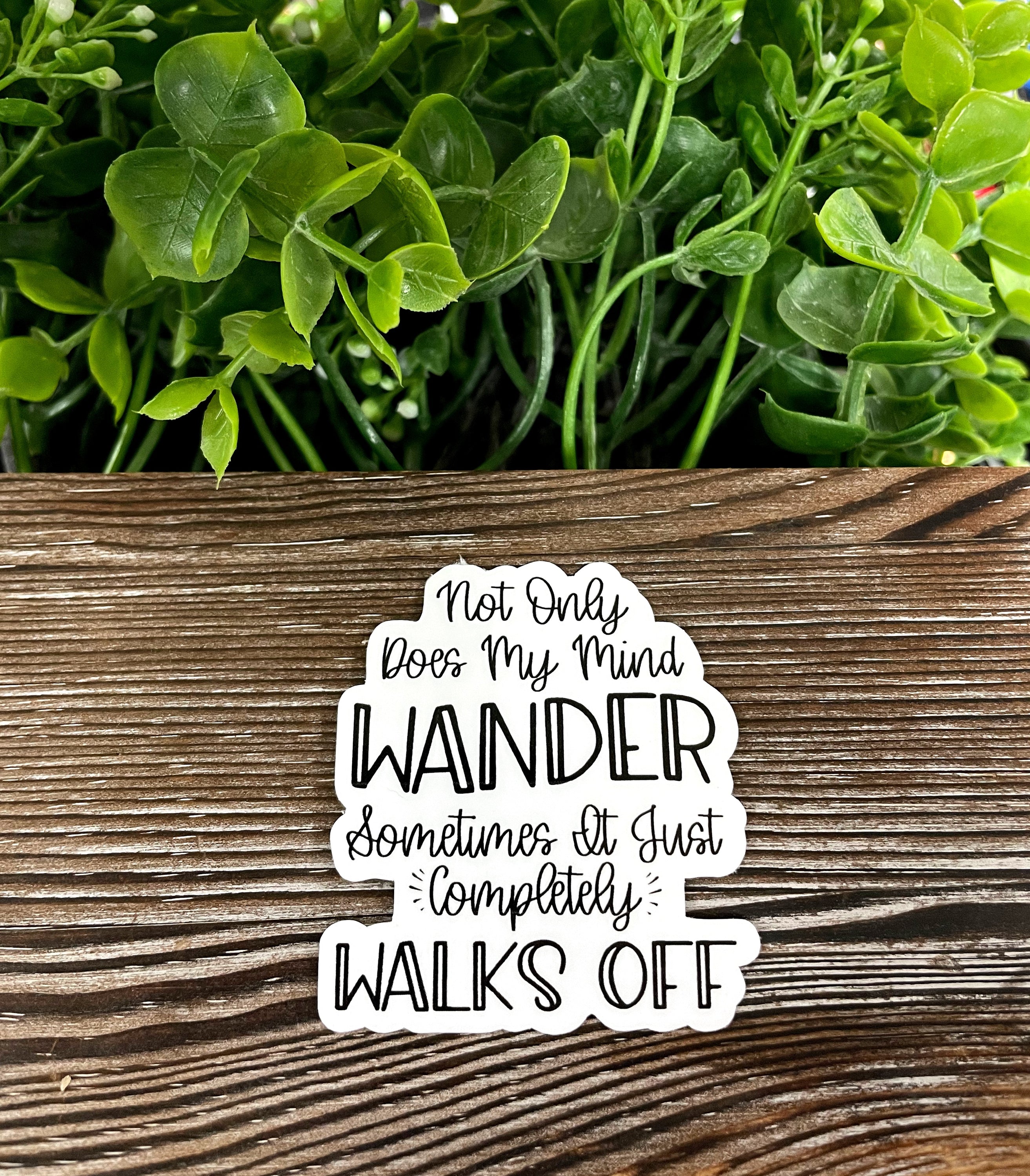 Colorful die cut stickers showcasing unique designs on a smooth surface.