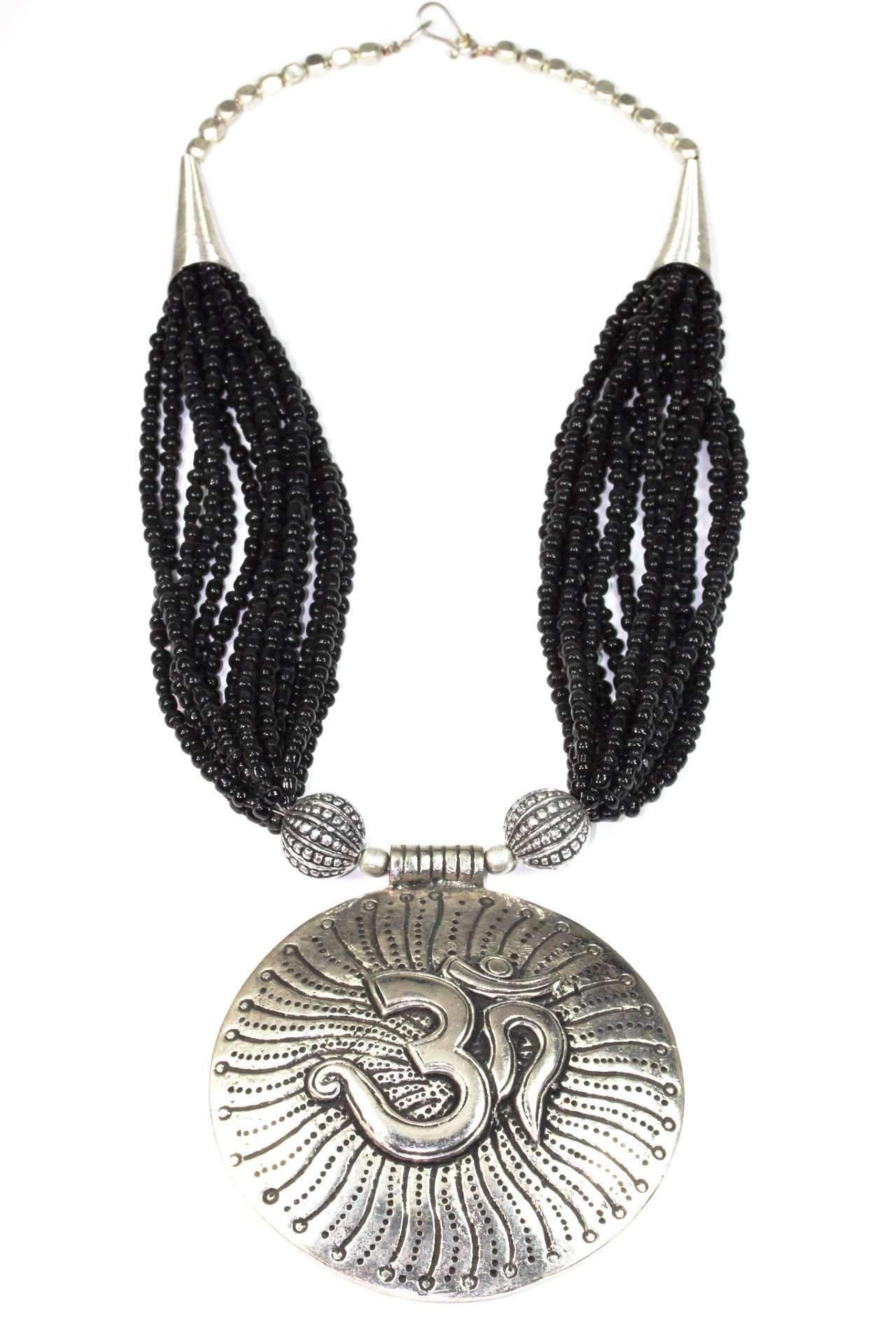 Om in Cosmos Statement Necklace featuring black beads and silvertone OM charms, handcrafted for spiritual elegance.