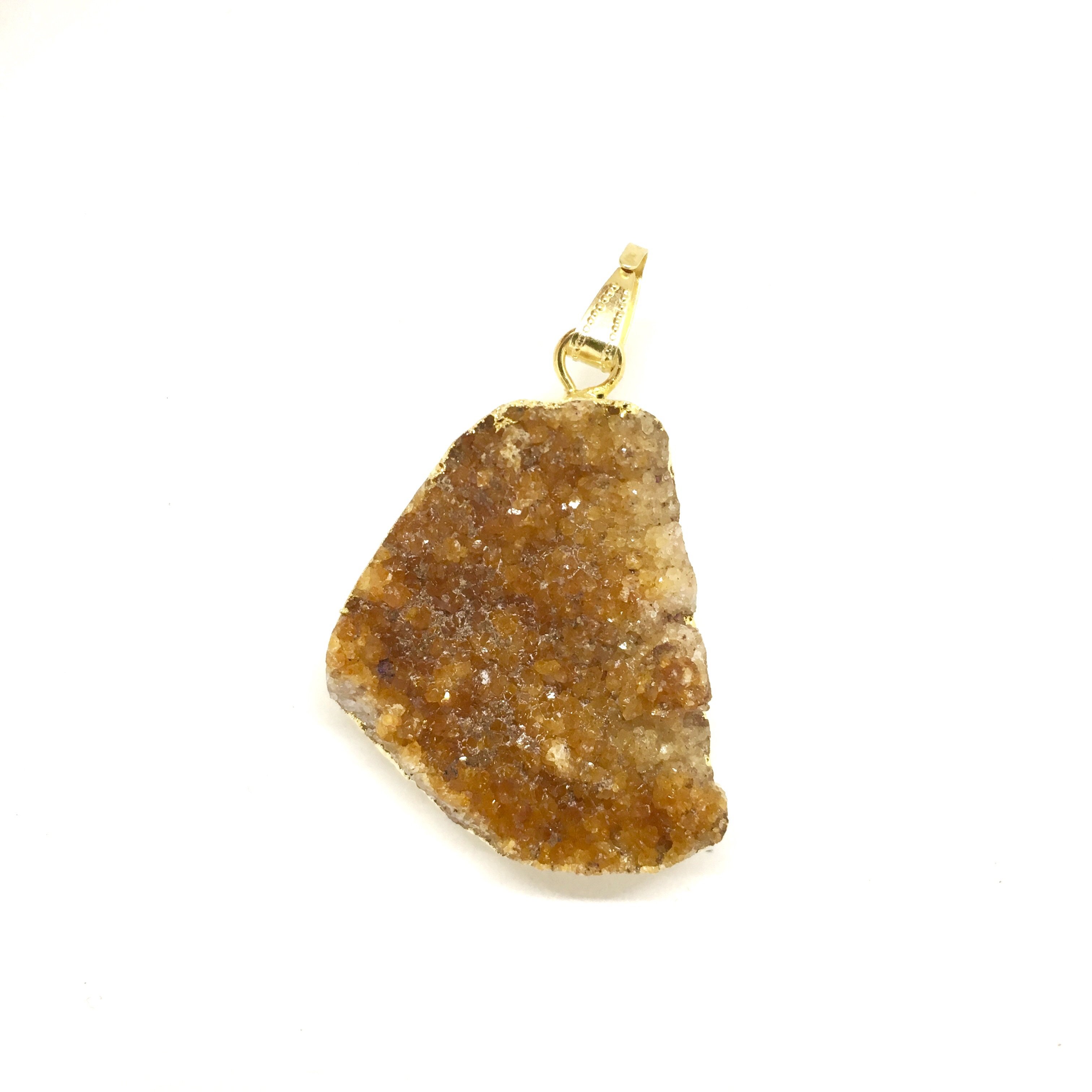 A stunning Orange Citrine Cluster Pendant featuring natural citrine stones in varying shades of amber and brown, elegantly gold metal plated, hanging from a tan suede necklace.