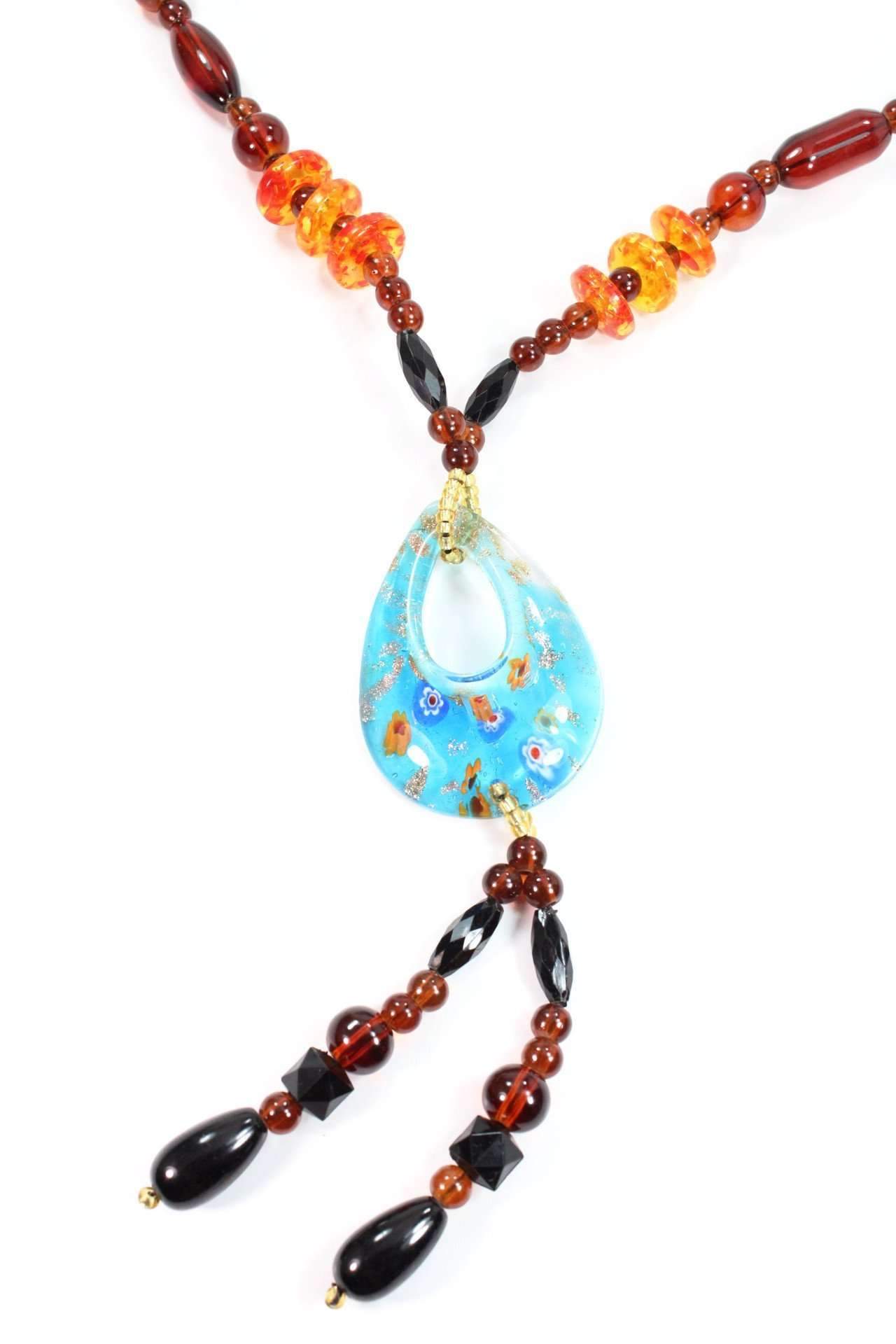 A beautiful Oval Pendant Gypsy Style Shimmer Necklace featuring colorful glass beads and a golden shimmering pendant with black drop beads.