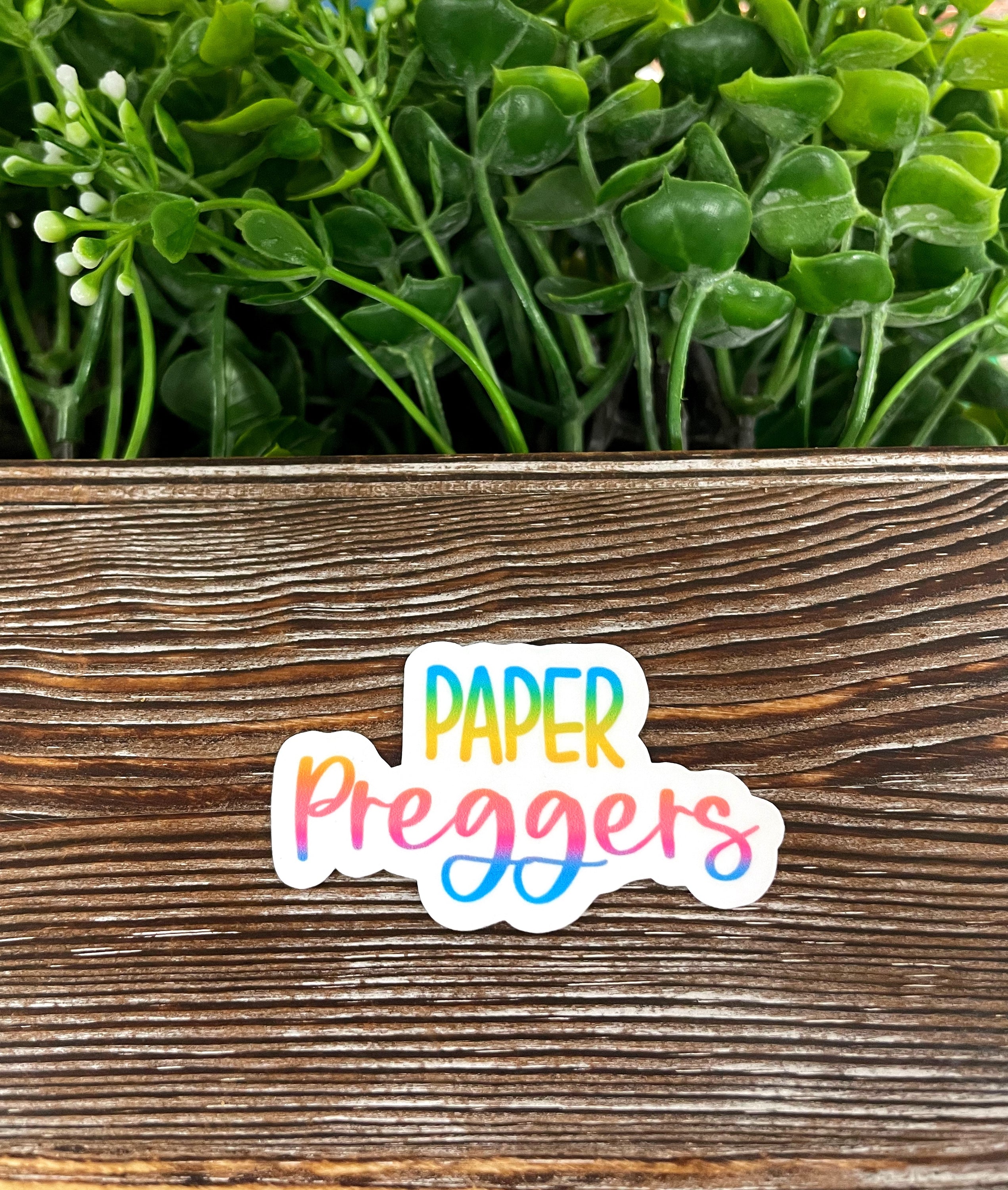 Colorful Paper Preggers die cut sticker featuring adoption love graphic art, ideal for personalizing smooth surfaces.