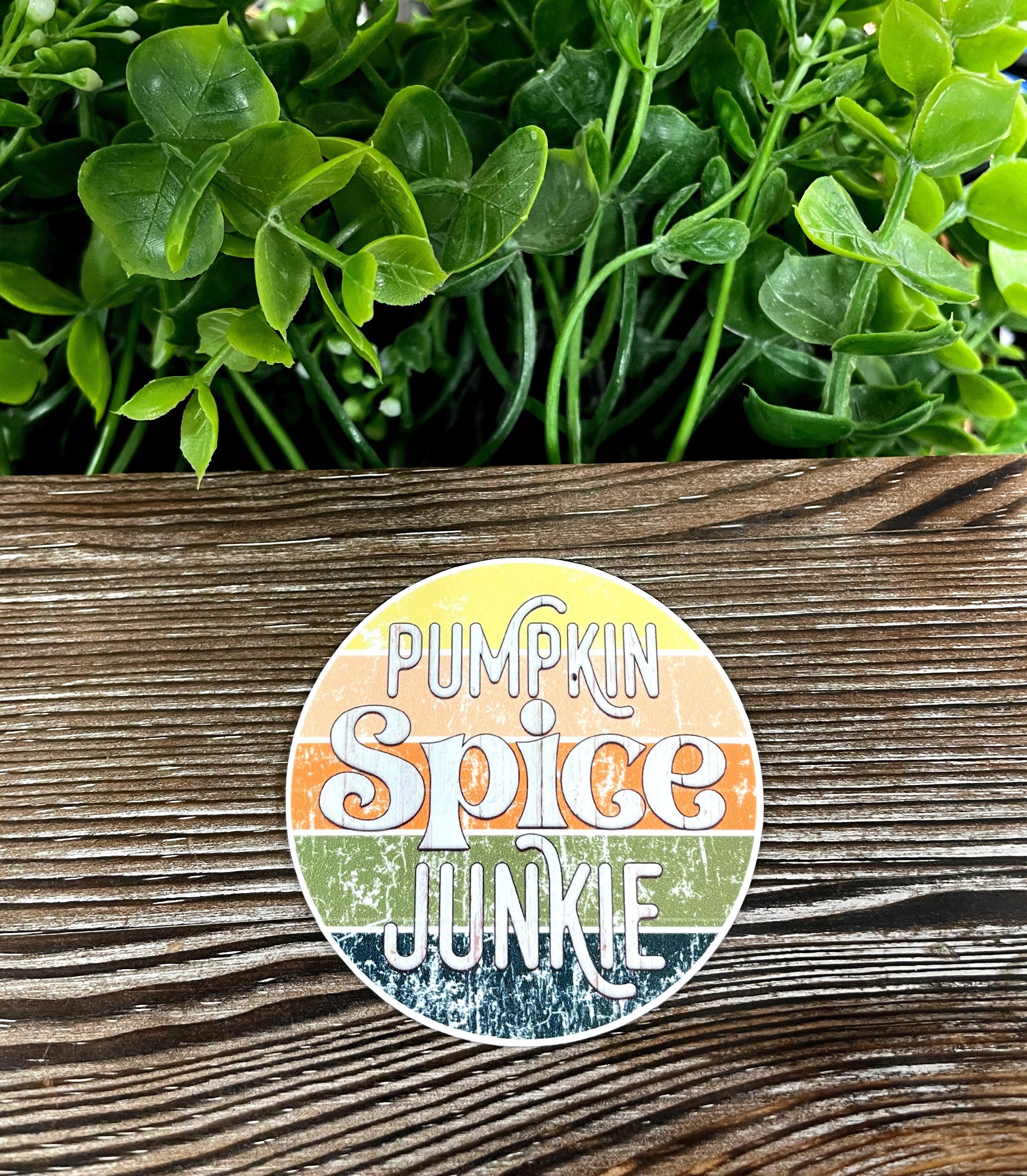 Pumpkin Spice Junkie die cut vinyl sticker featuring a boho design, perfect for decorating various smooth surfaces.