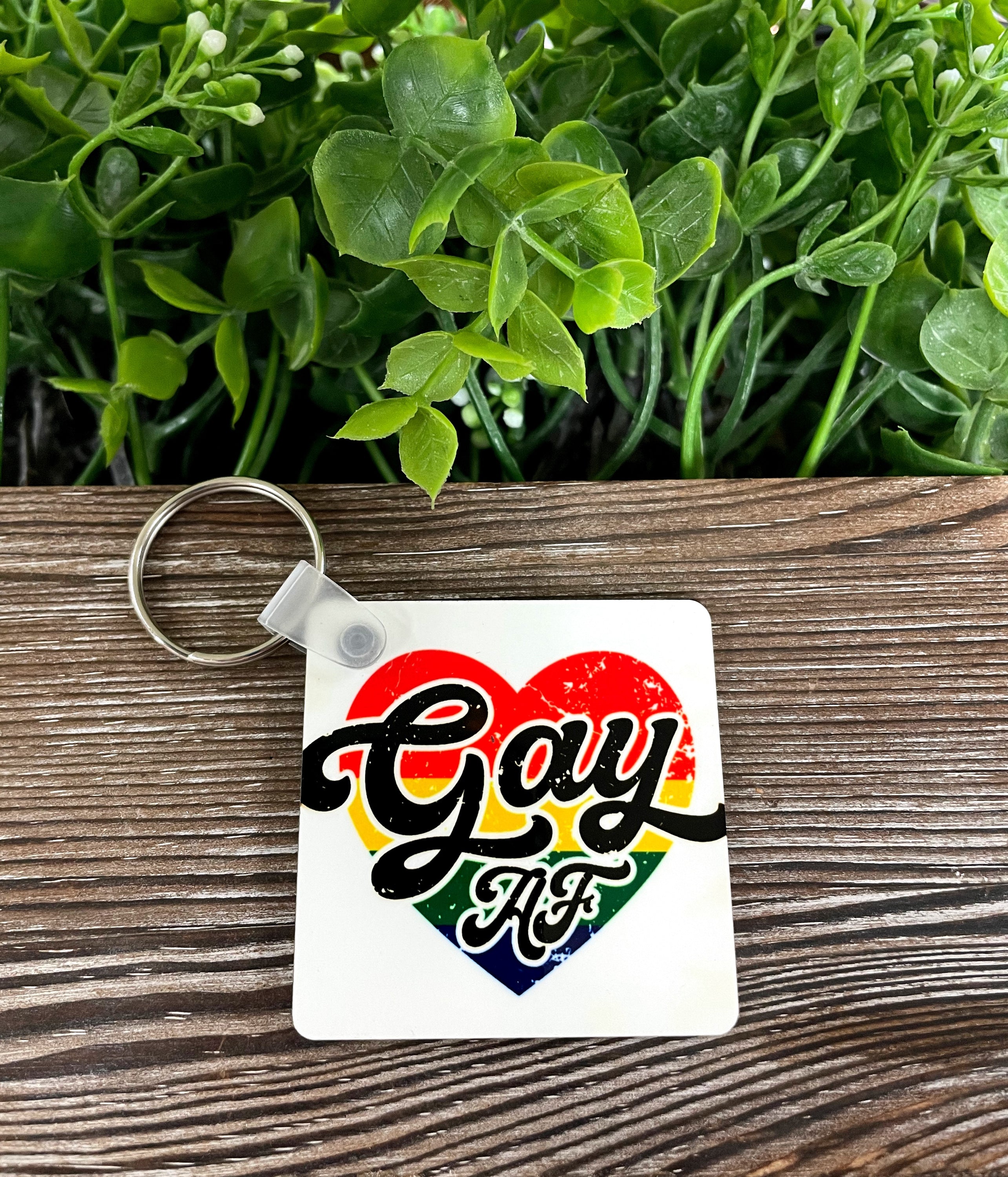 Rainbow Heart Gay AF MDF Square Keychain featuring vibrant colors and a heart design, perfect for expressing pride and individuality.