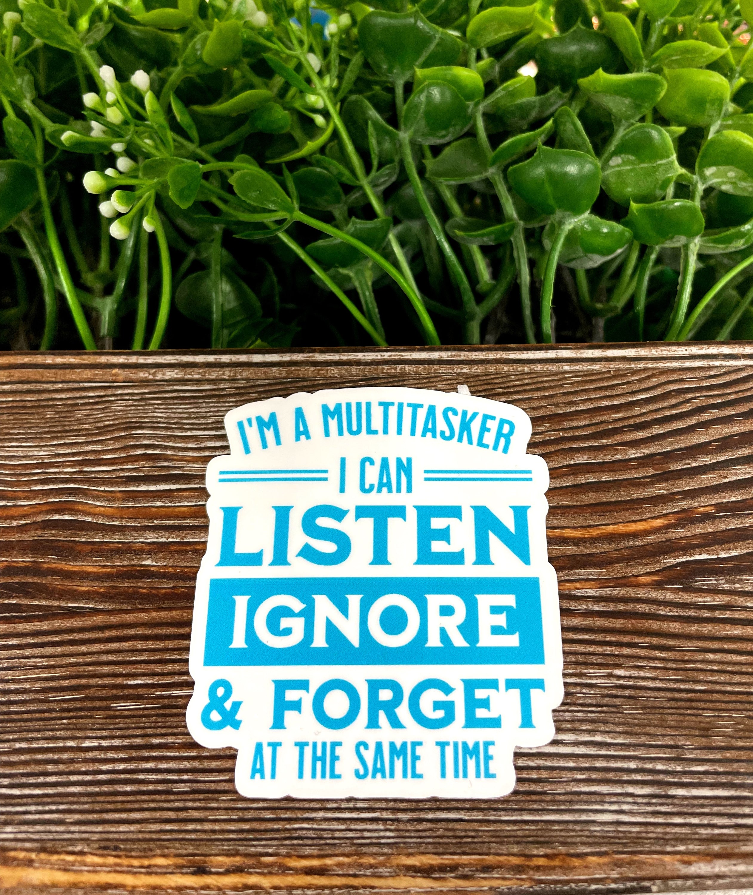 Sarcastic quote die cut sticker on a smooth surface, showcasing vibrant colors and a humorous design.