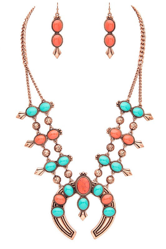 A stunning Squash Blossom Western Necklace Set featuring a 20-inch necklace and 2-inch drop earrings, showcasing intricate western-inspired designs.