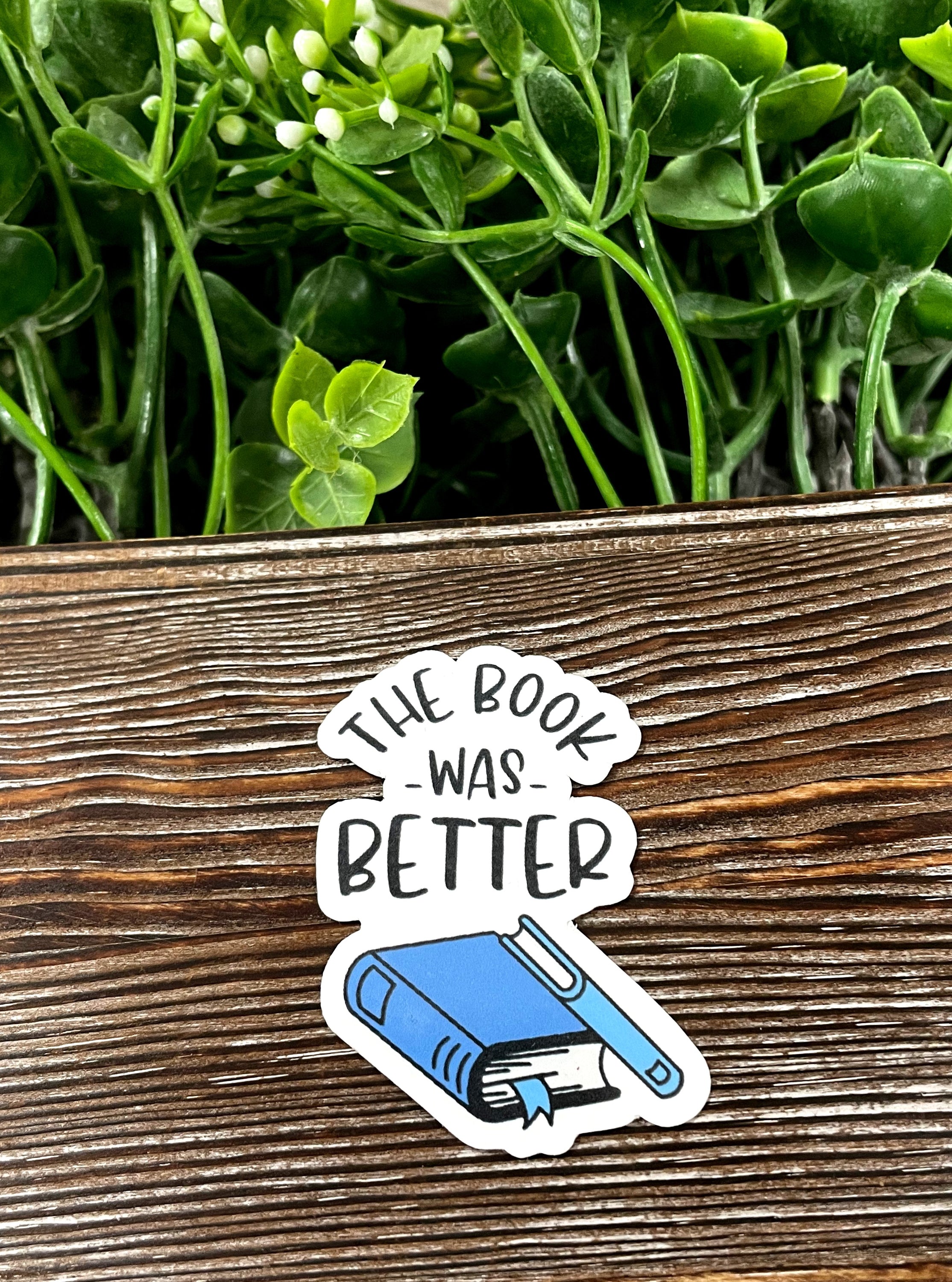 Die cut sticker featuring the phrase 'The Book was Better', showcasing vibrant colors and a stylish design, perfect for book lovers.