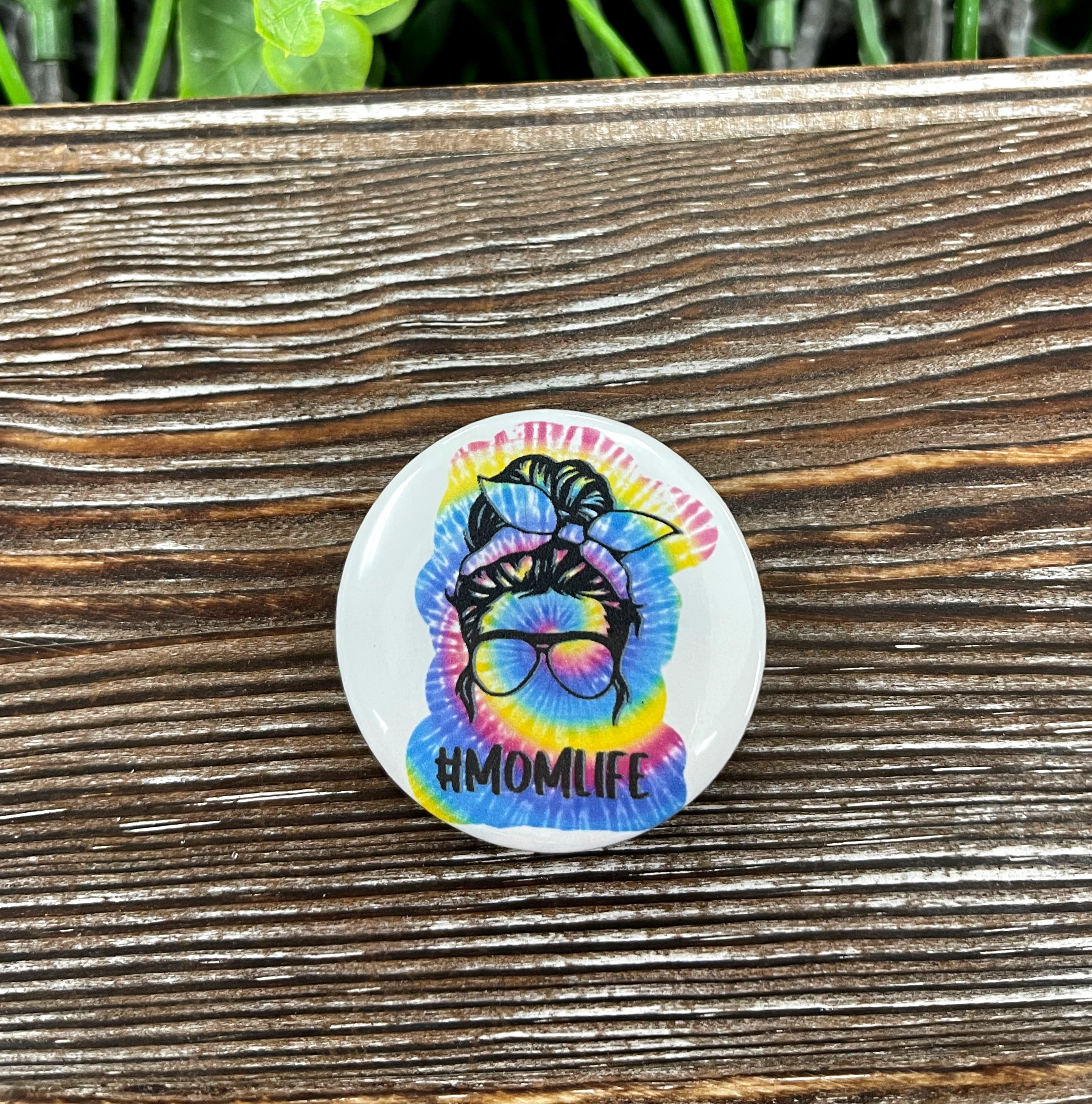 Colorful Tie Dye Mom Life Graphic Art Button, 1.25 inches, featuring a vibrant design perfect for personalizing bags and accessories.