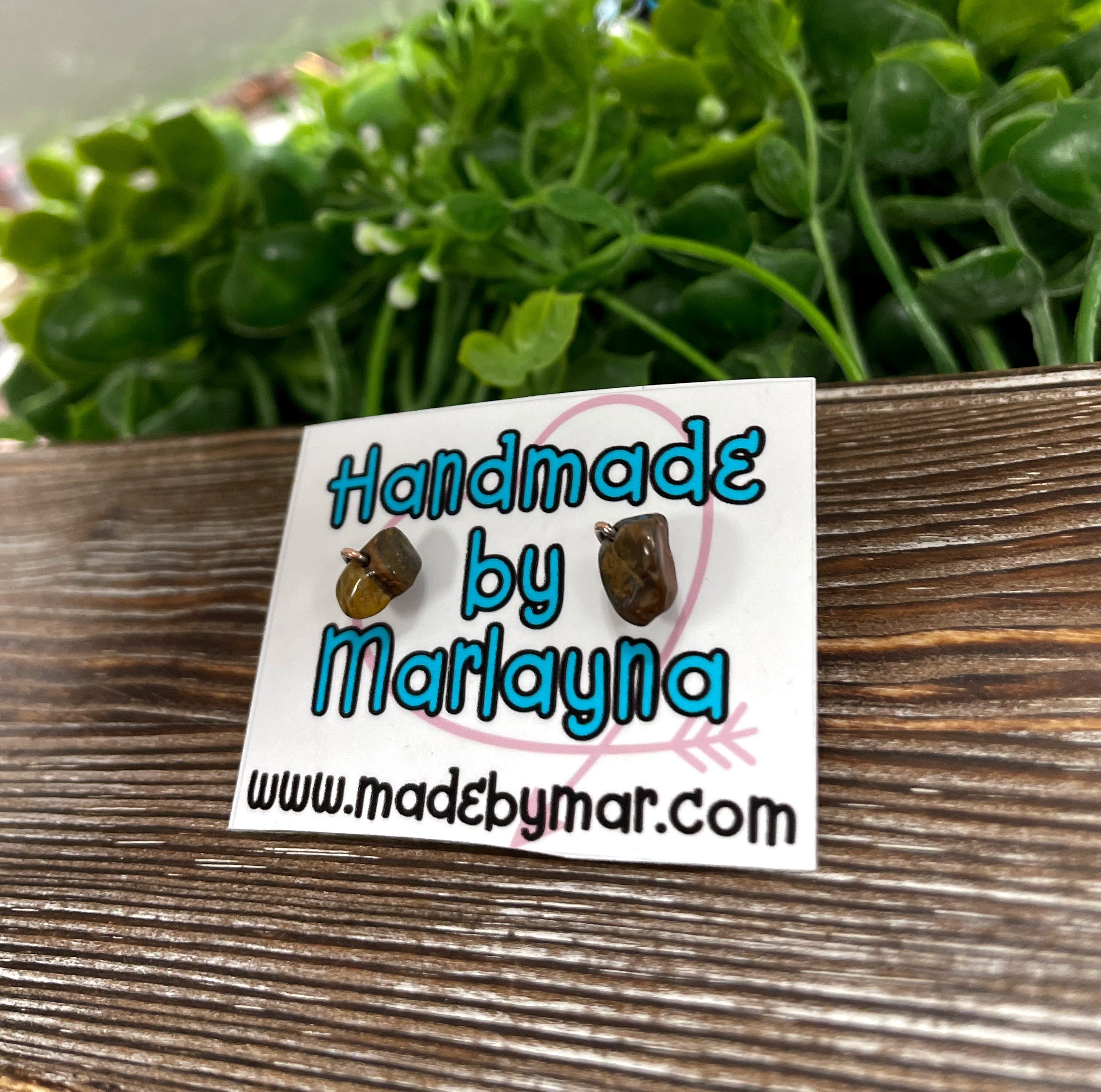 Handmade Tiger Eye gemstone chip copper stud earrings, showcasing unique patterns and oxidized copper design.