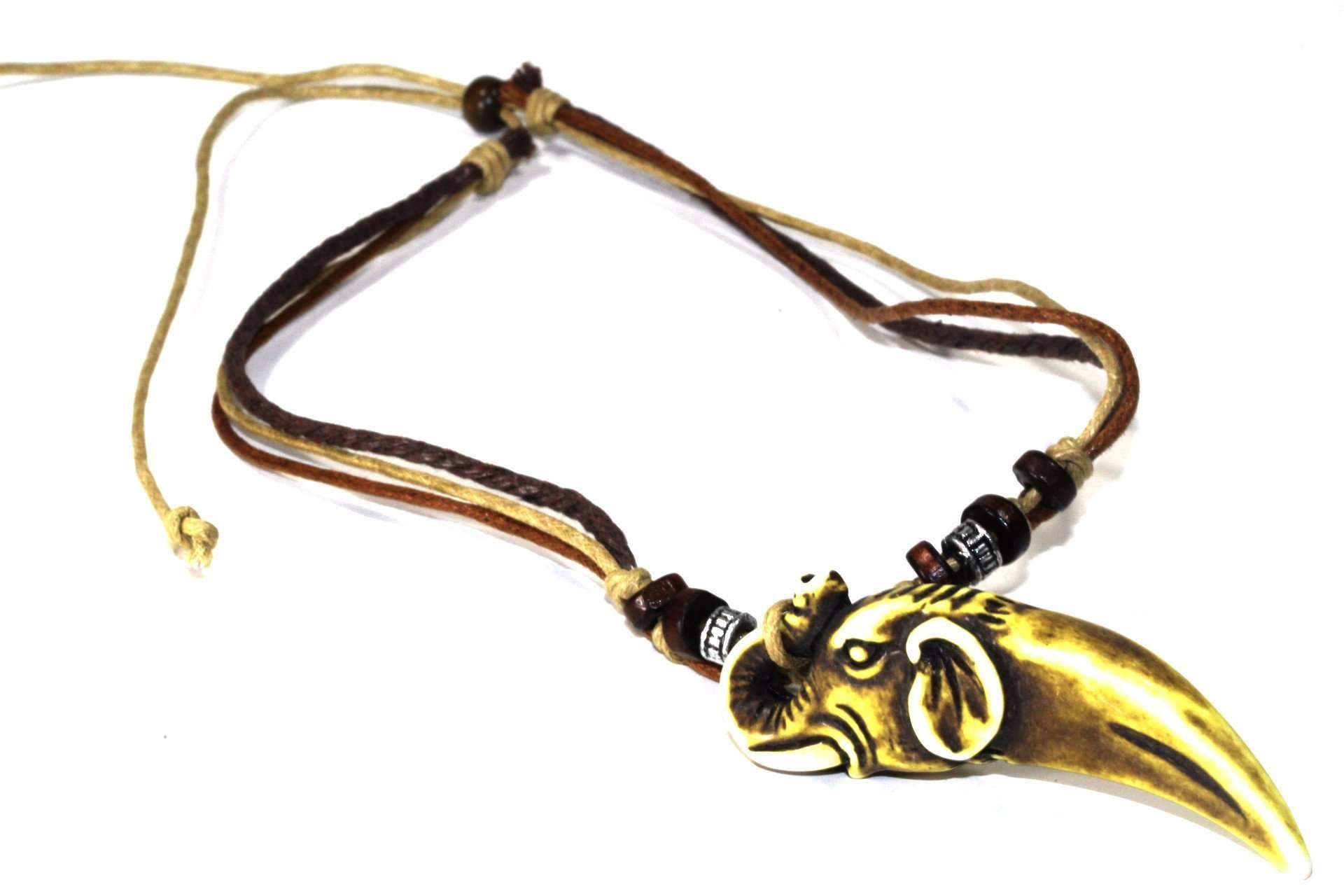 Tribal Elephant Tusk Boho Style Necklace featuring a carved elephant head pendant, tri-color cord, and wooden beads.