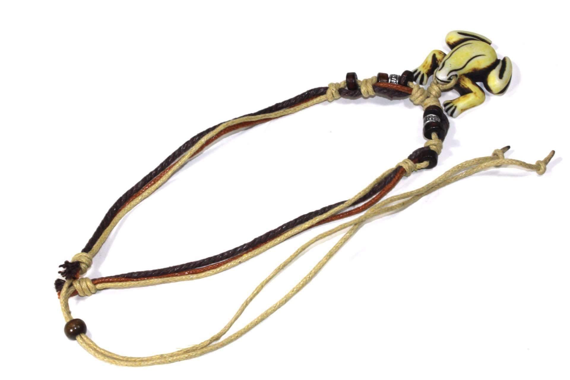 Tribal Frog Boho Style Necklace featuring a hand-carved frog pendant, tri-color cord, and wooden beads, perfect for bohemian fashion.