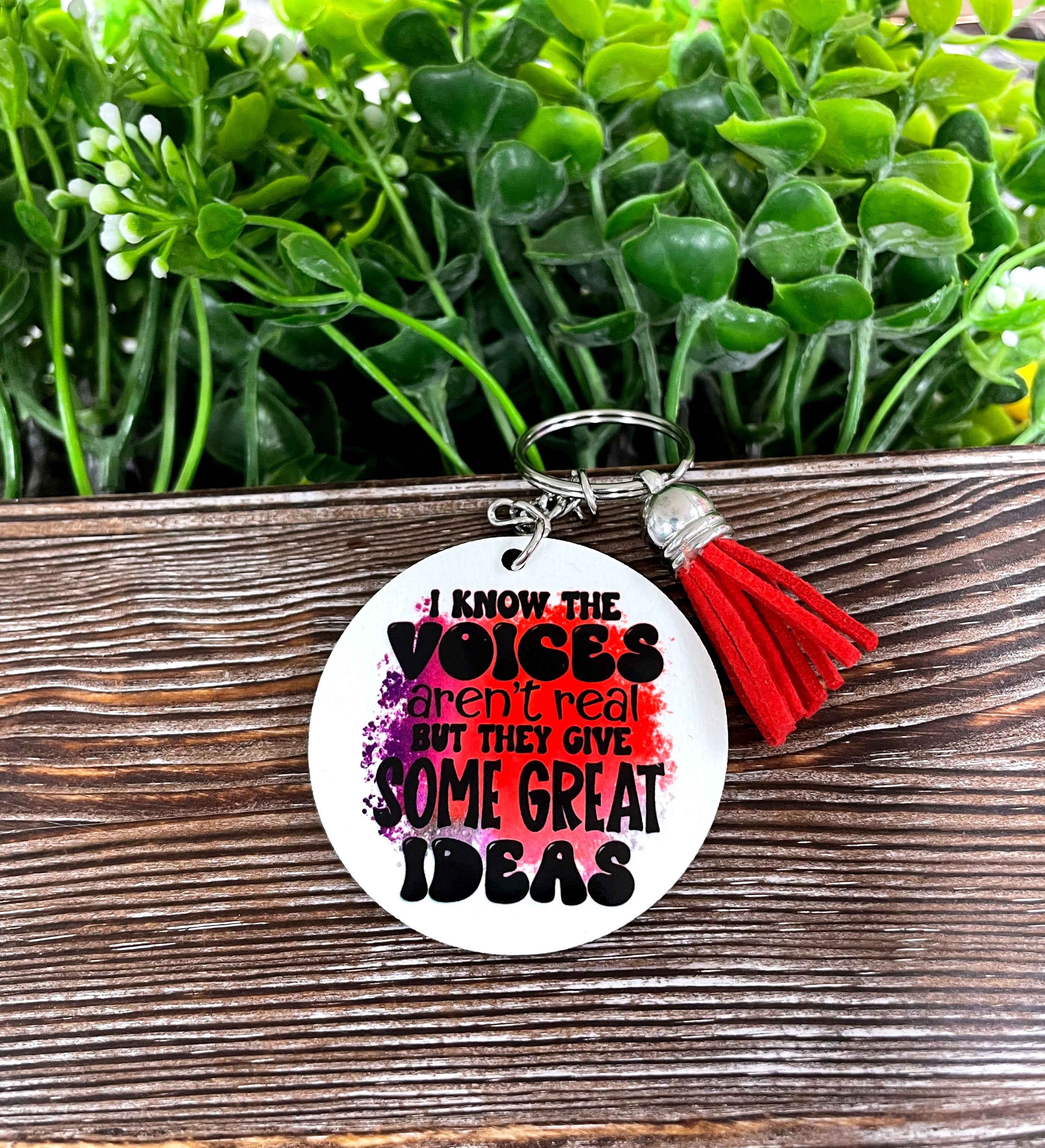 A colorful MDF round keychain featuring boho designs, lightweight and perfect for personal expression.