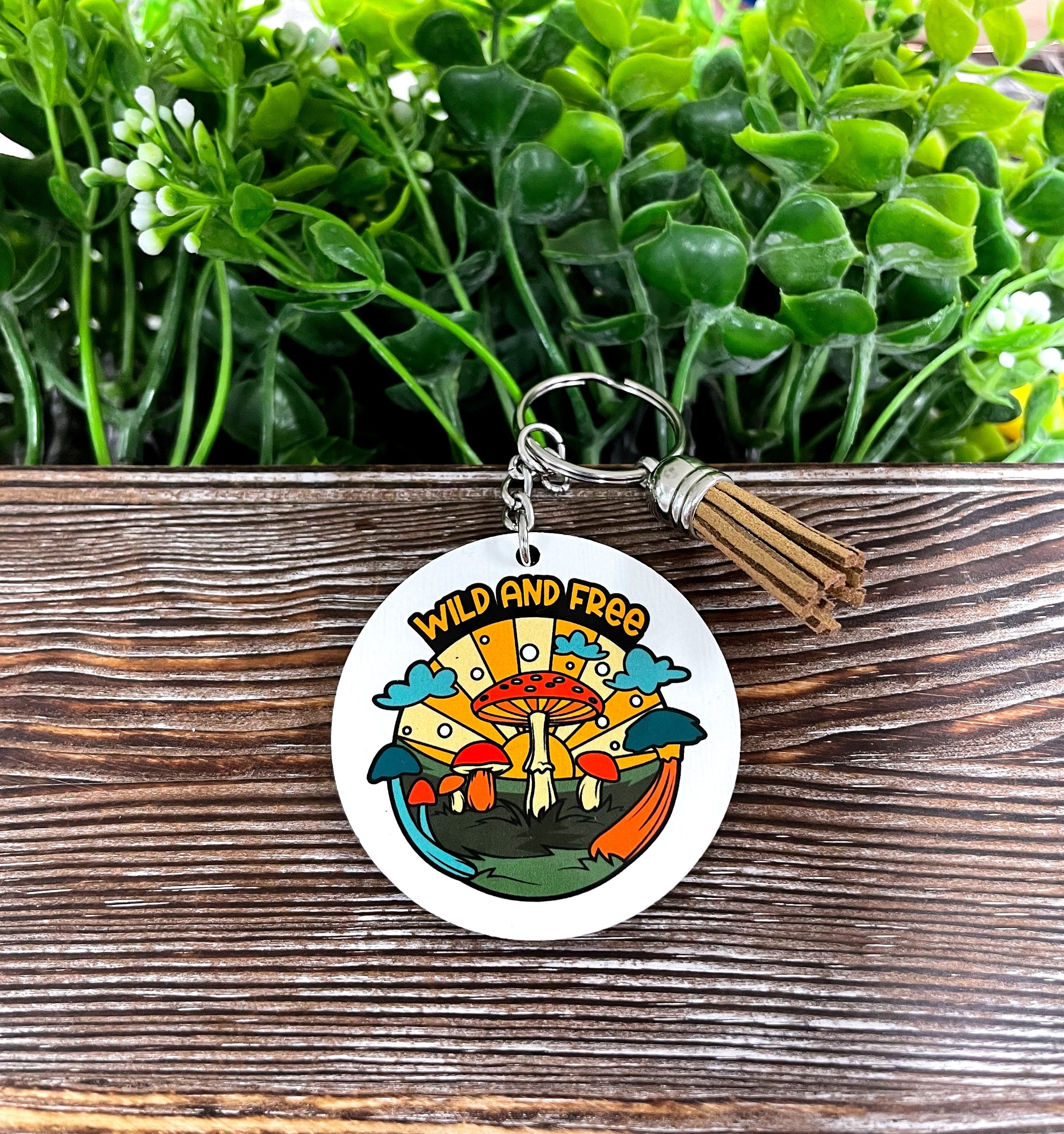 Wild and Free Mushrooms MDF Round Keychain featuring a vibrant mushroom design on a lightweight engineered wood base.