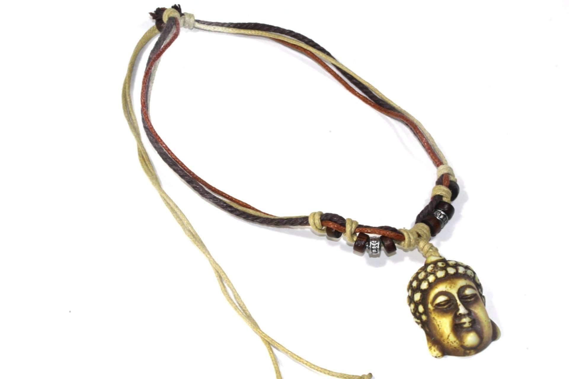 Wise Buddha Boho Style Necklace featuring a carved Buddha pendant, wooden beads, and tri-color cord in beige, brown, and tan.