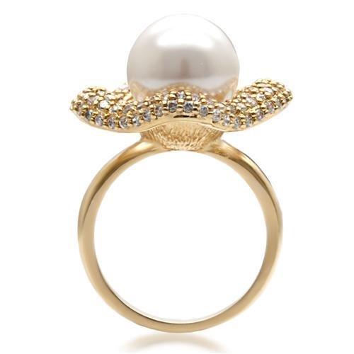 1W103 Gold Brass Ring featuring a beautiful synthetic pearl in white, showcasing its elegant design and luxurious finish.